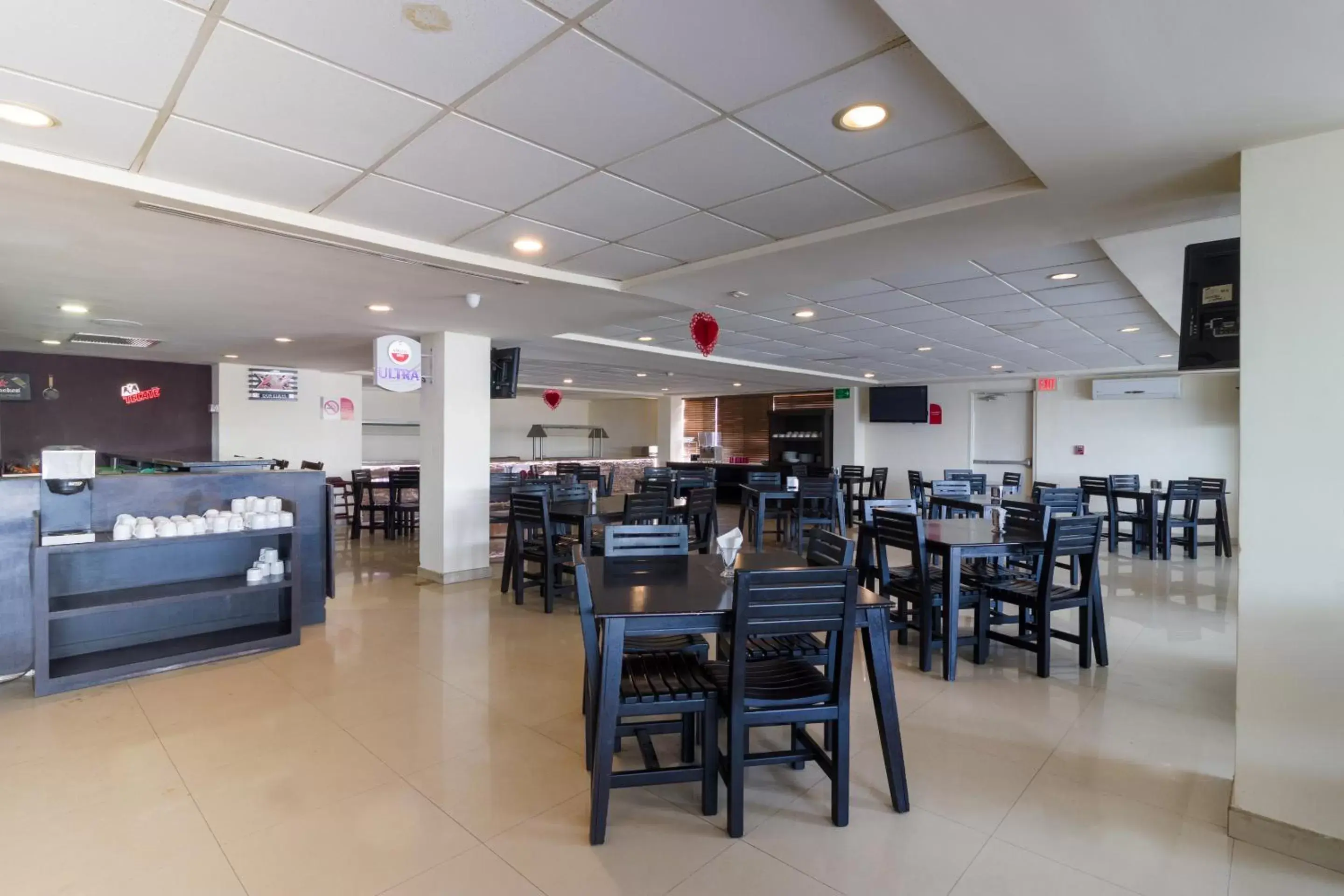 Restaurant/Places to Eat in Capital O Hotel Herederos, Piedras Negras
