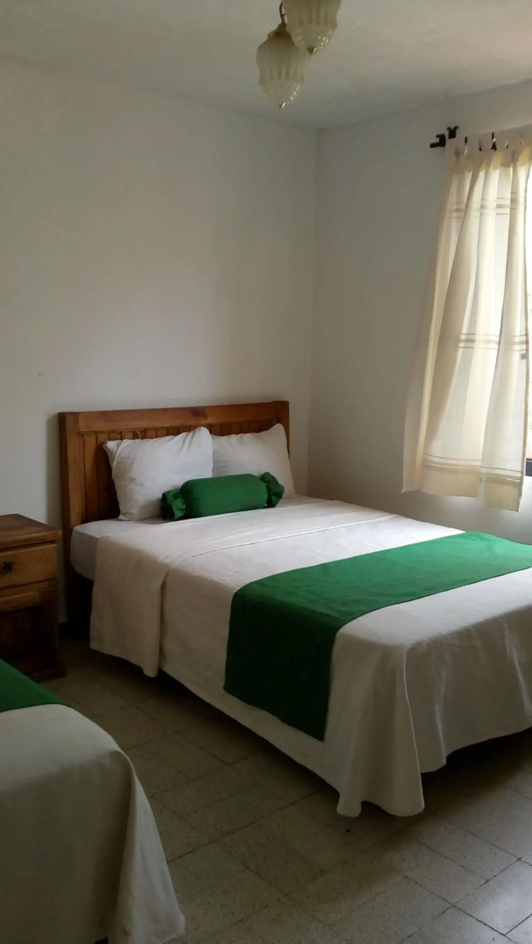 Bed in Villas del Sol Hotel & Bungalows