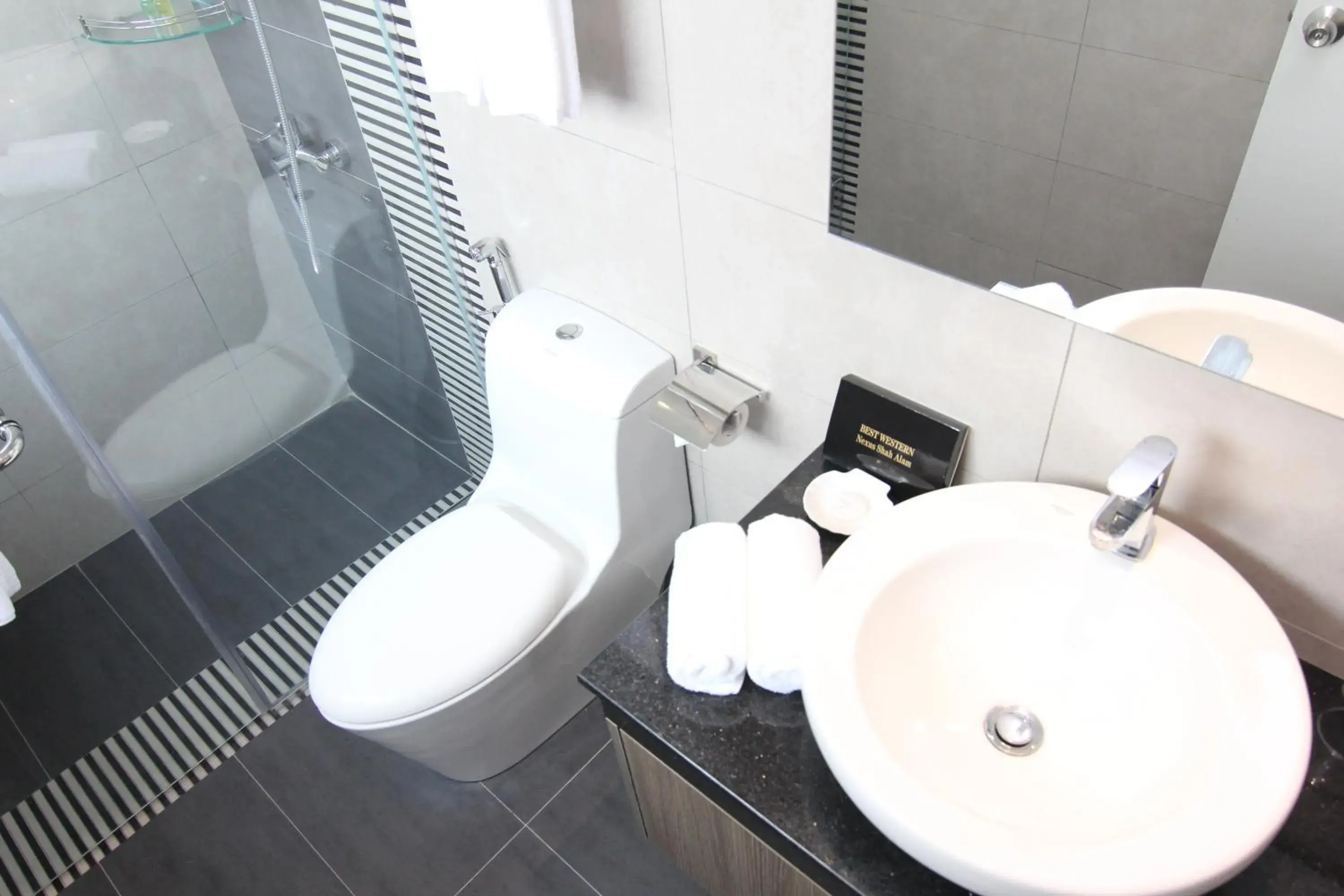 Bathroom in Nexus Business Suite Hotel