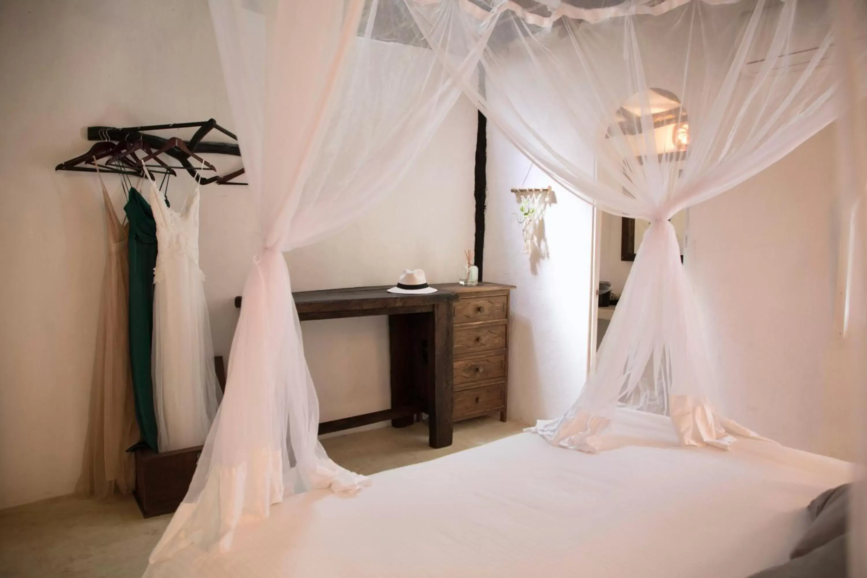 Bed, Kitchen/Kitchenette in Coco Tulum Beach Club Hotel