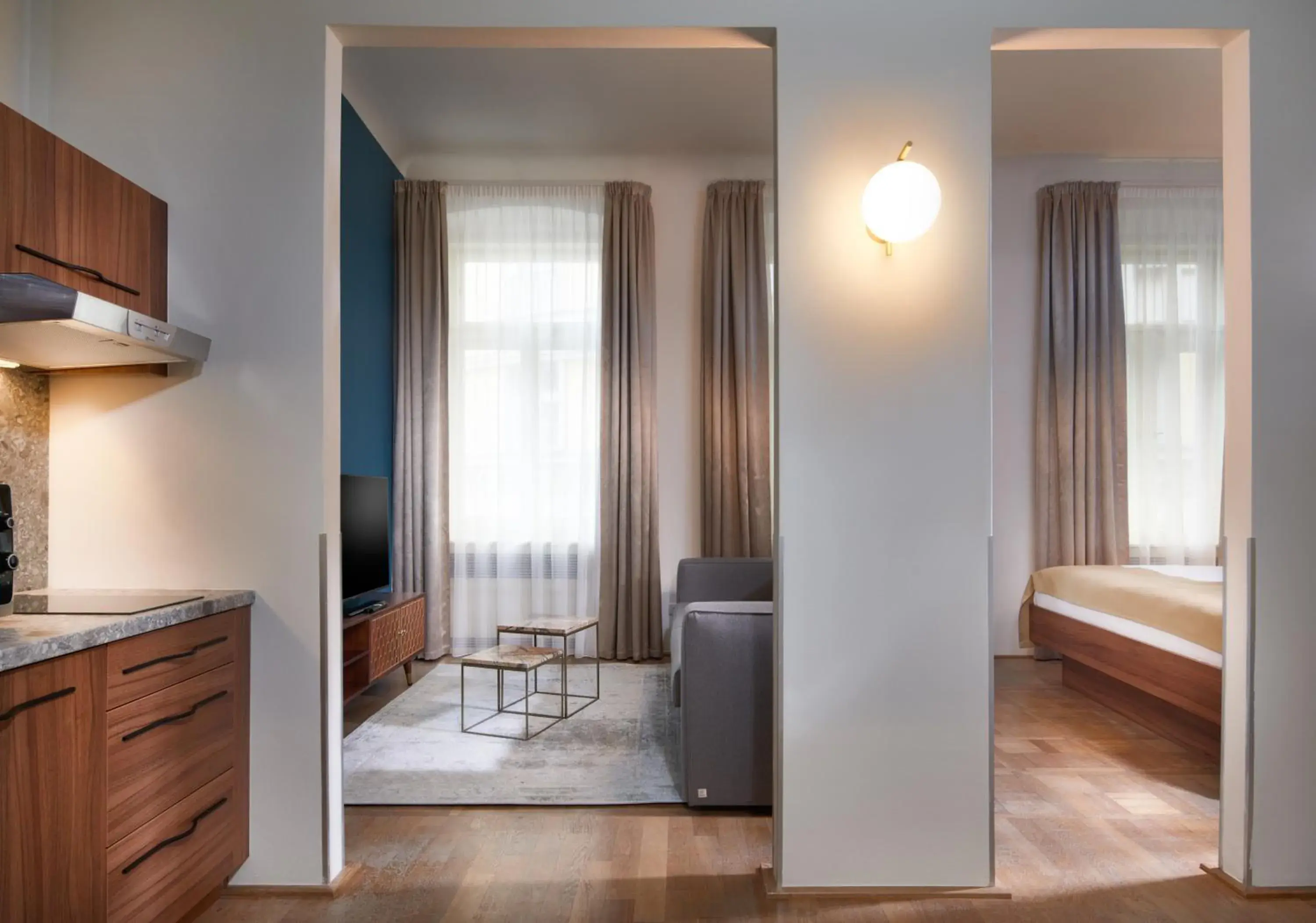 Bedroom, TV/Entertainment Center in Golden Angel Suites by Adrez Living