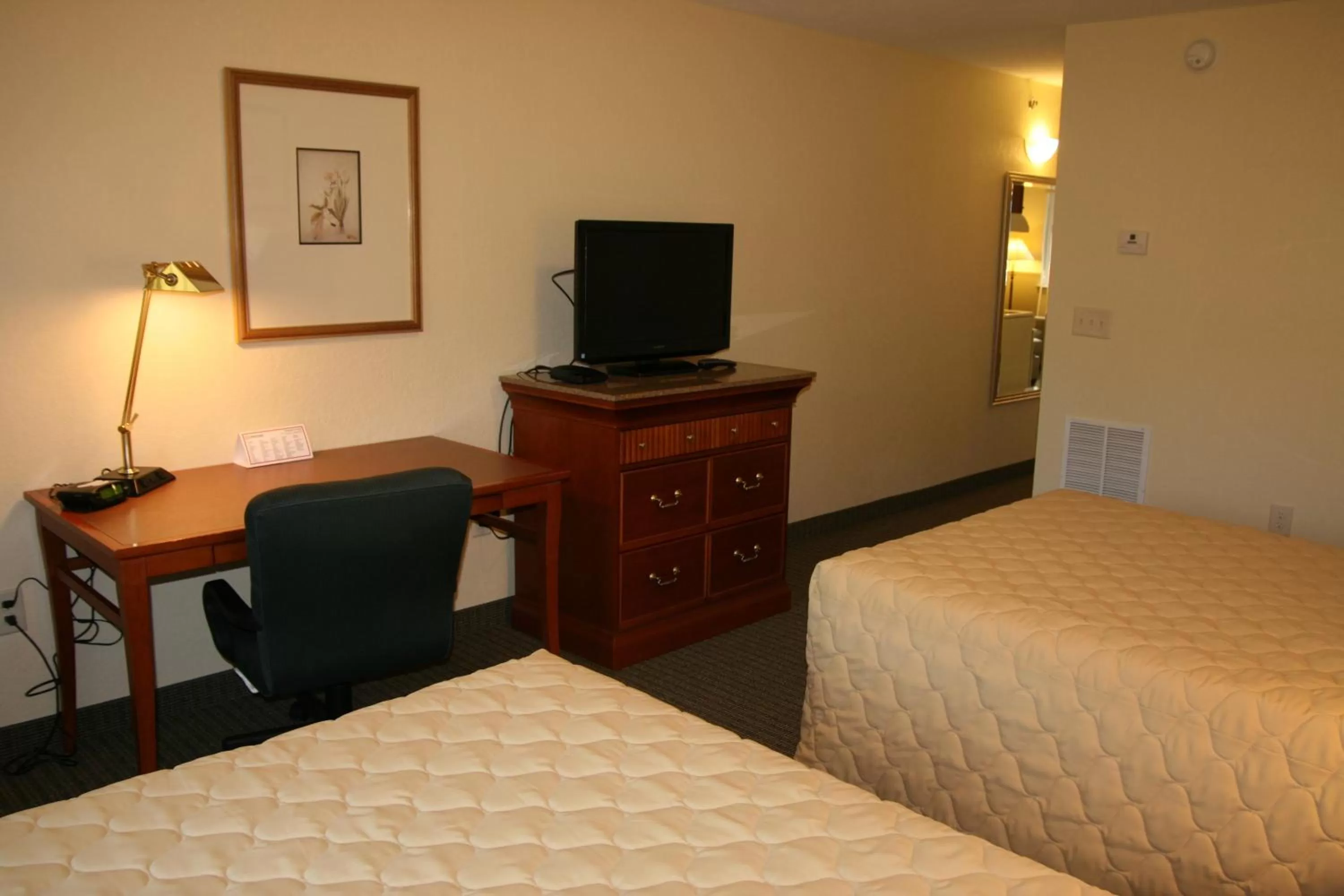 Bed in Affordable Suites of America Augusta