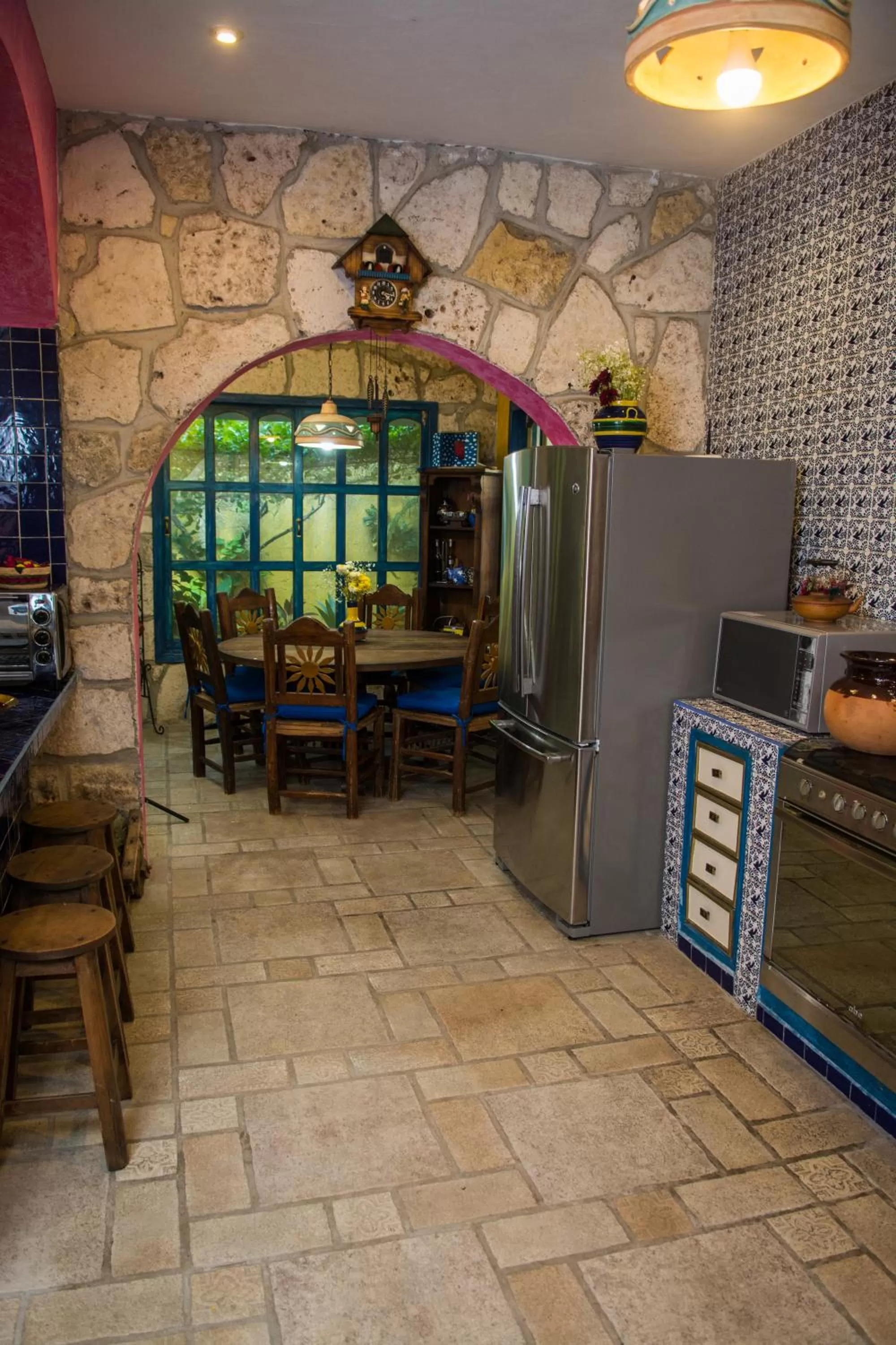 Communal kitchen in Hacienda Boutique B&B and Spa Solo Adultos