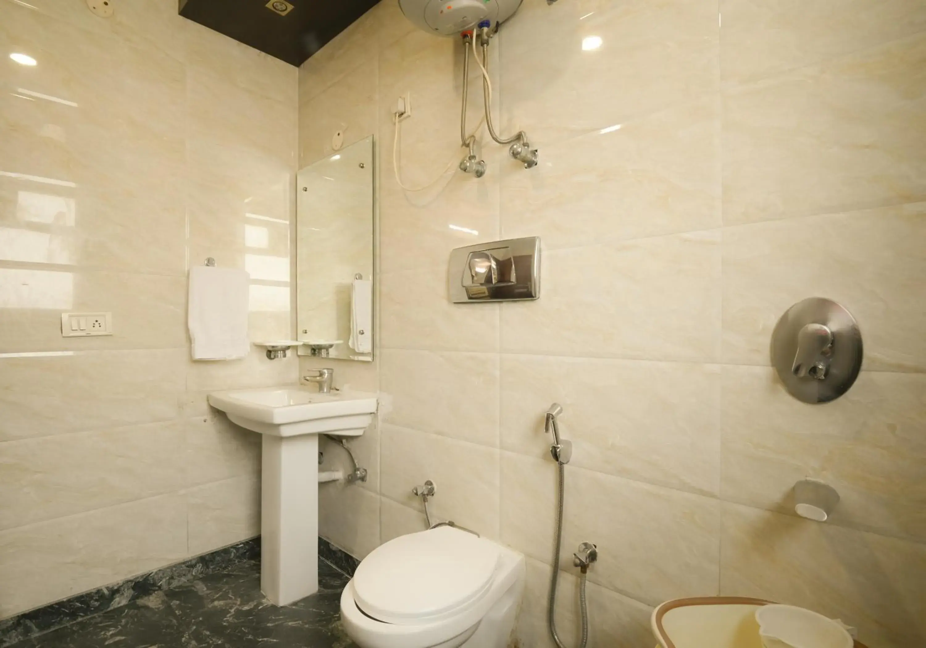 Bathroom in Hotel Krishna Deluxe-By RCG Hotels
