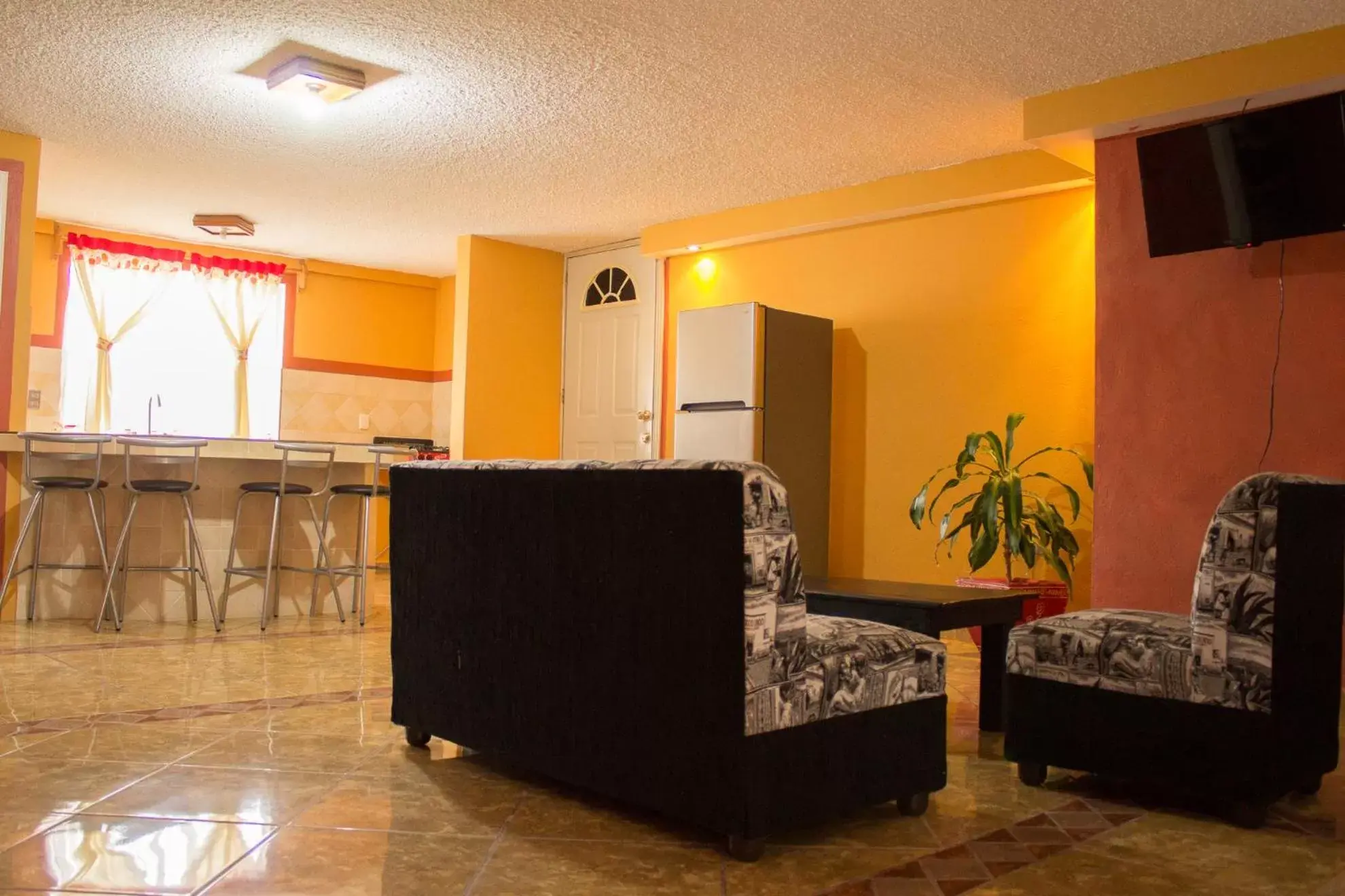 Living room, Lobby/Reception in Hotel & Suites Cerro Roj0