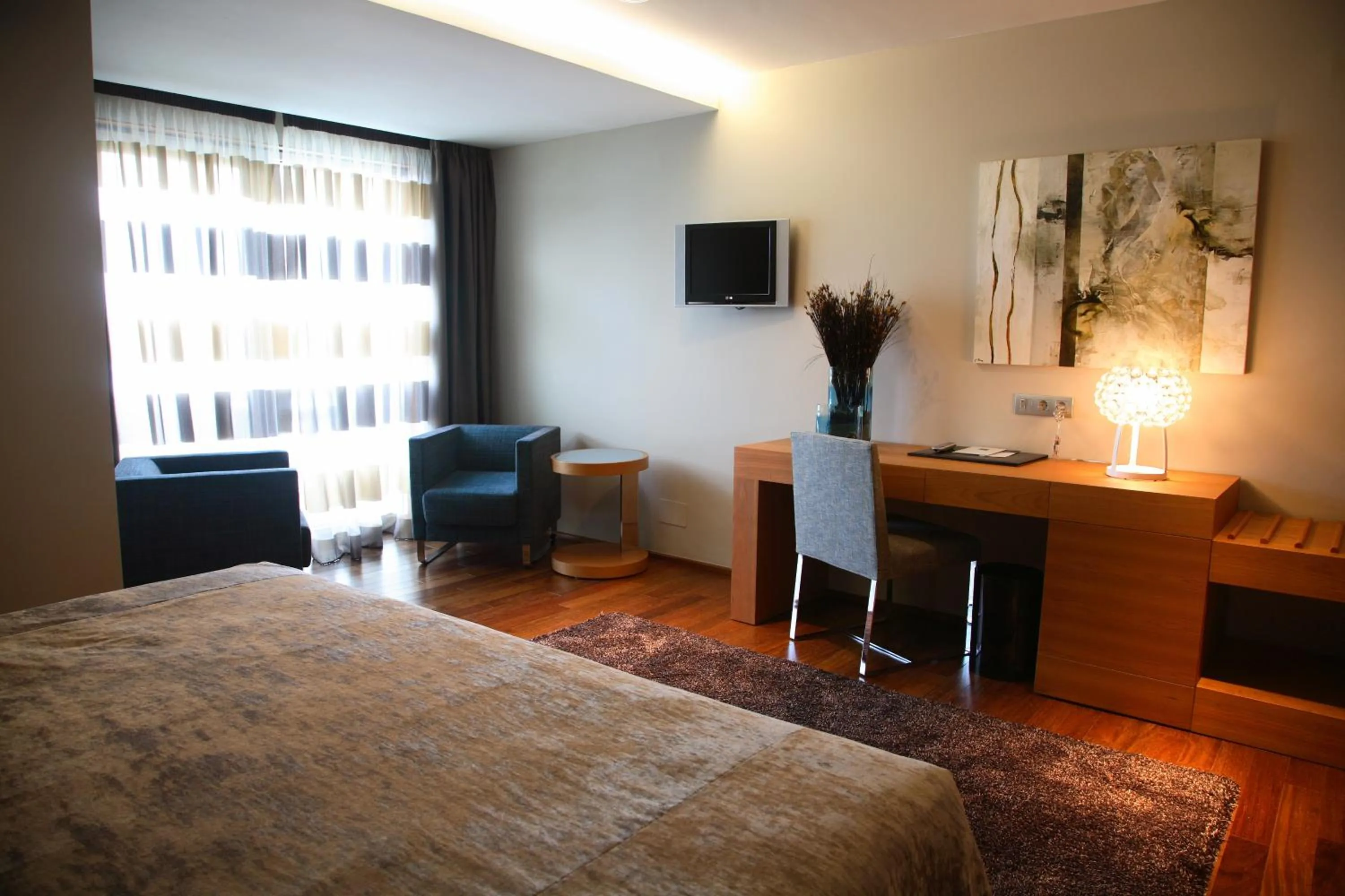 Seating area, Bed in Hotel Ego