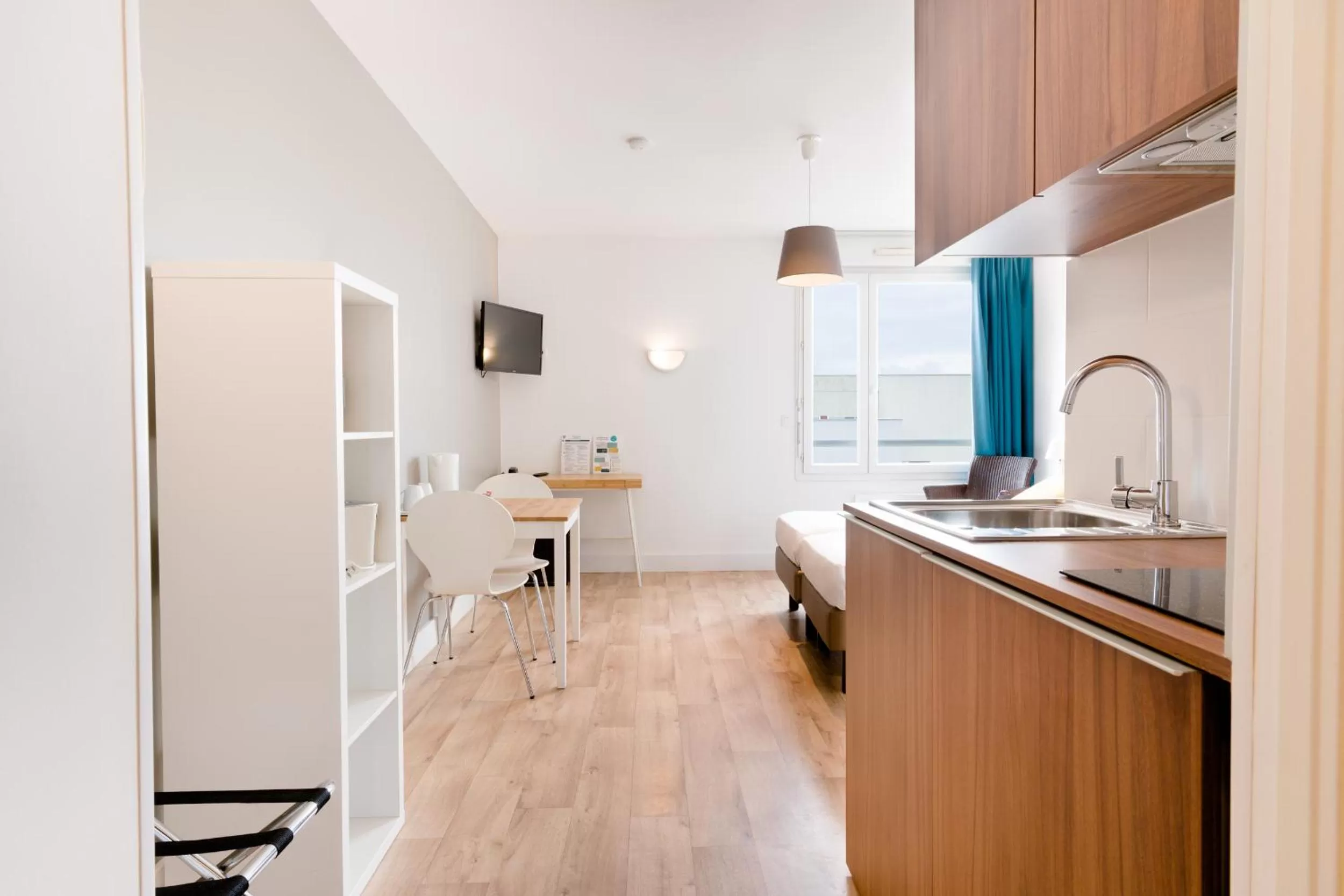 Photo of the whole room in Appart'hotel Victoria Garden Pau