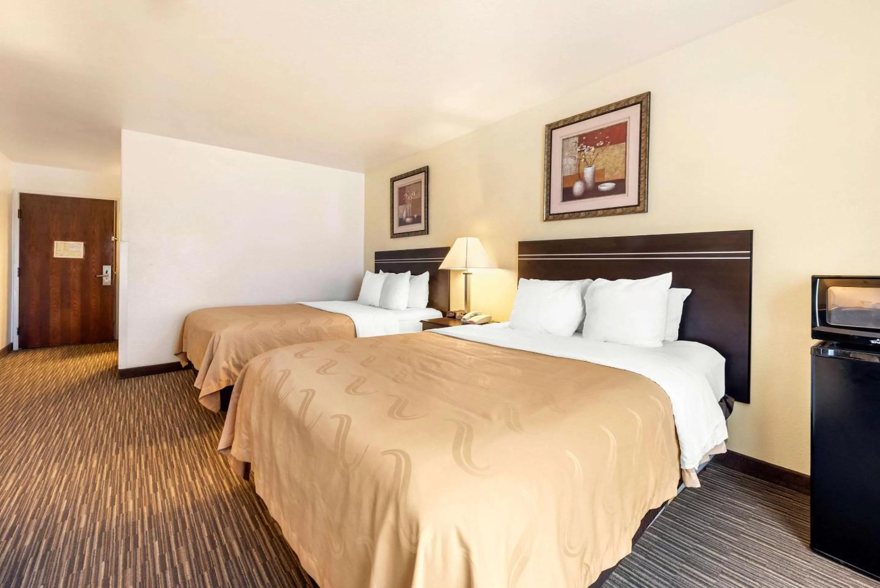 Photo of the whole room, Bed in Quality Inn & Suites Limon