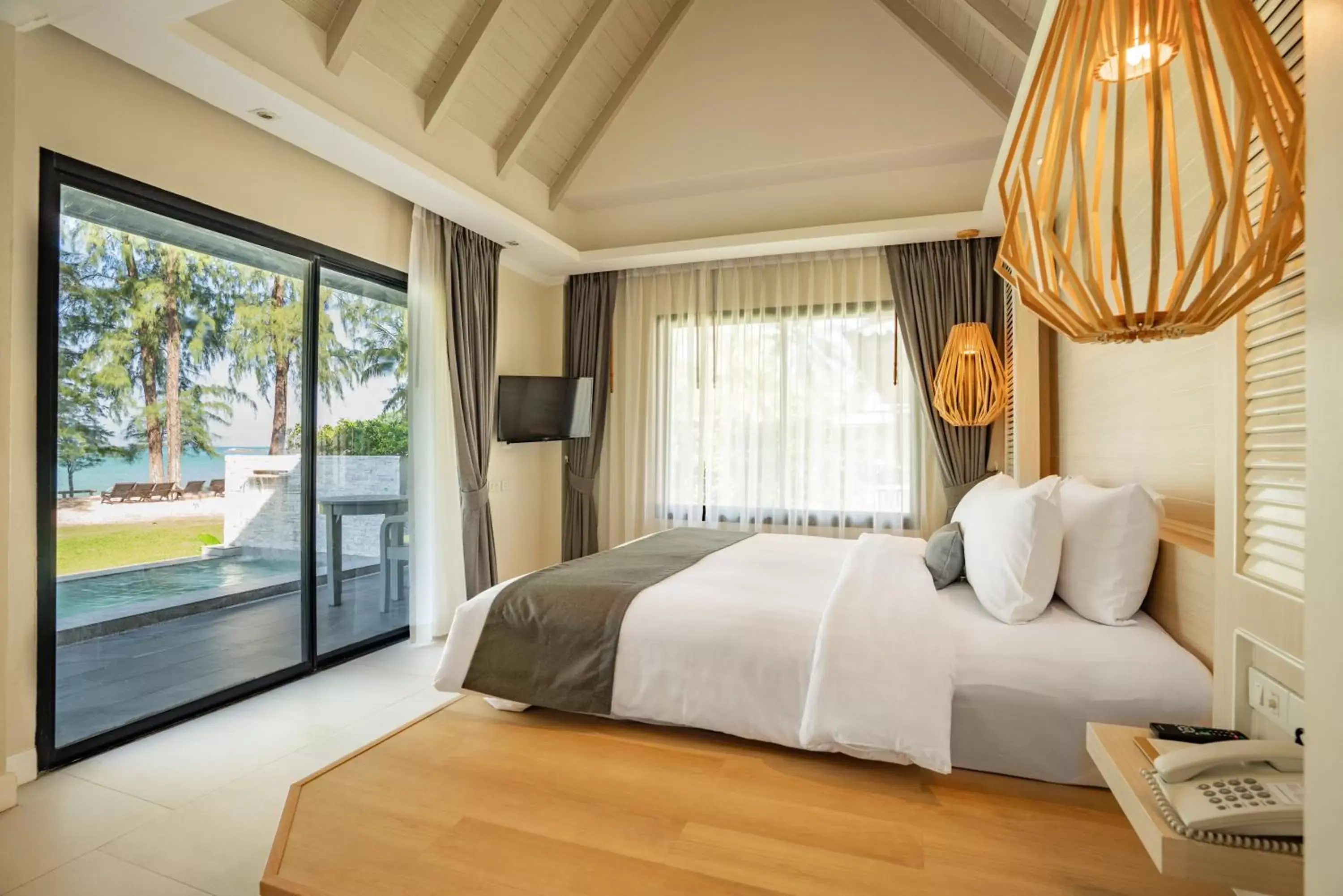 Bed in Khaolak Emerald Surf Beach Resort and Spa - SHA Extra Plus