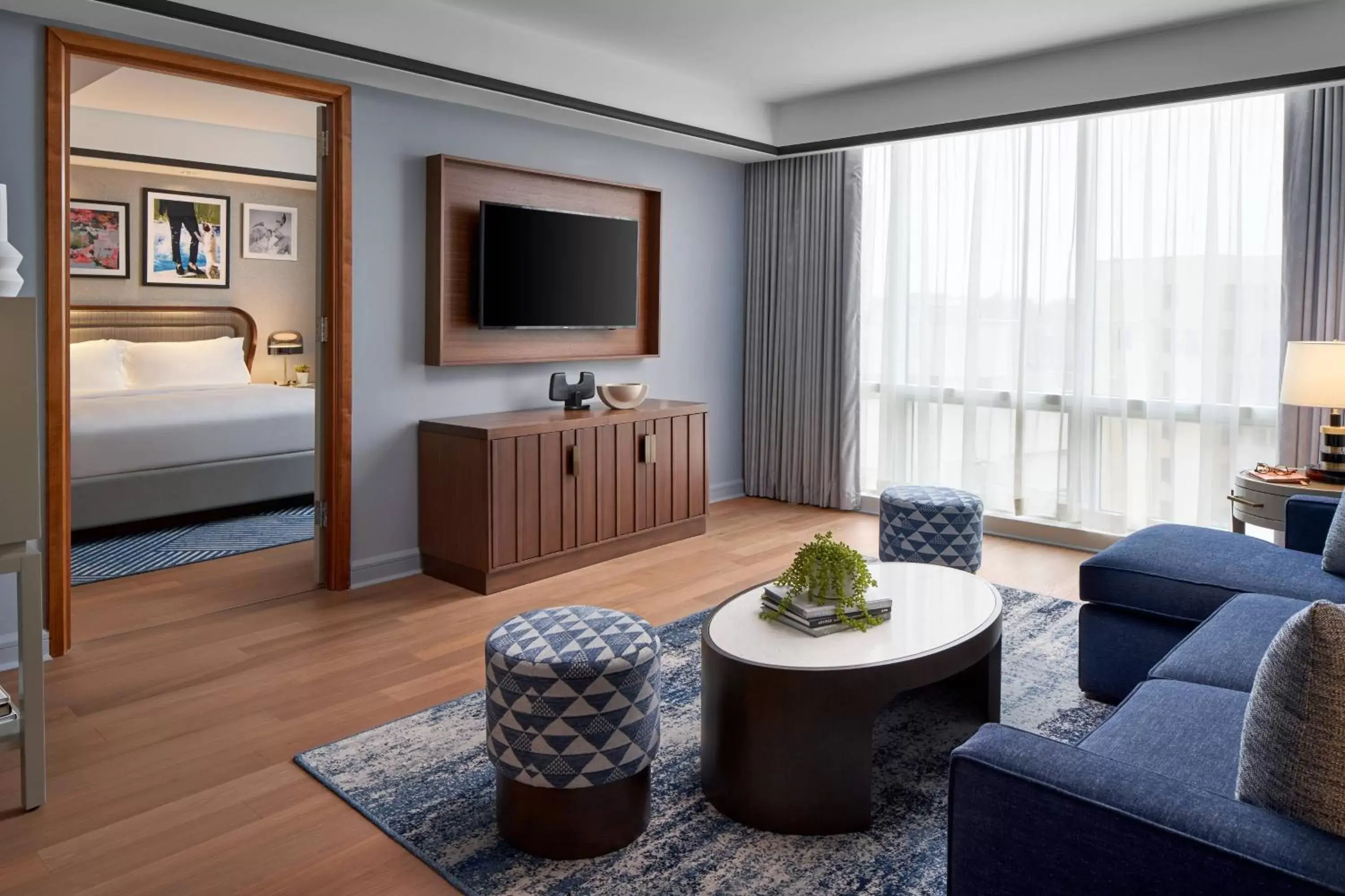 Photo of the whole room, TV/Entertainment Center in The Opus Westchester, Autograph Collection