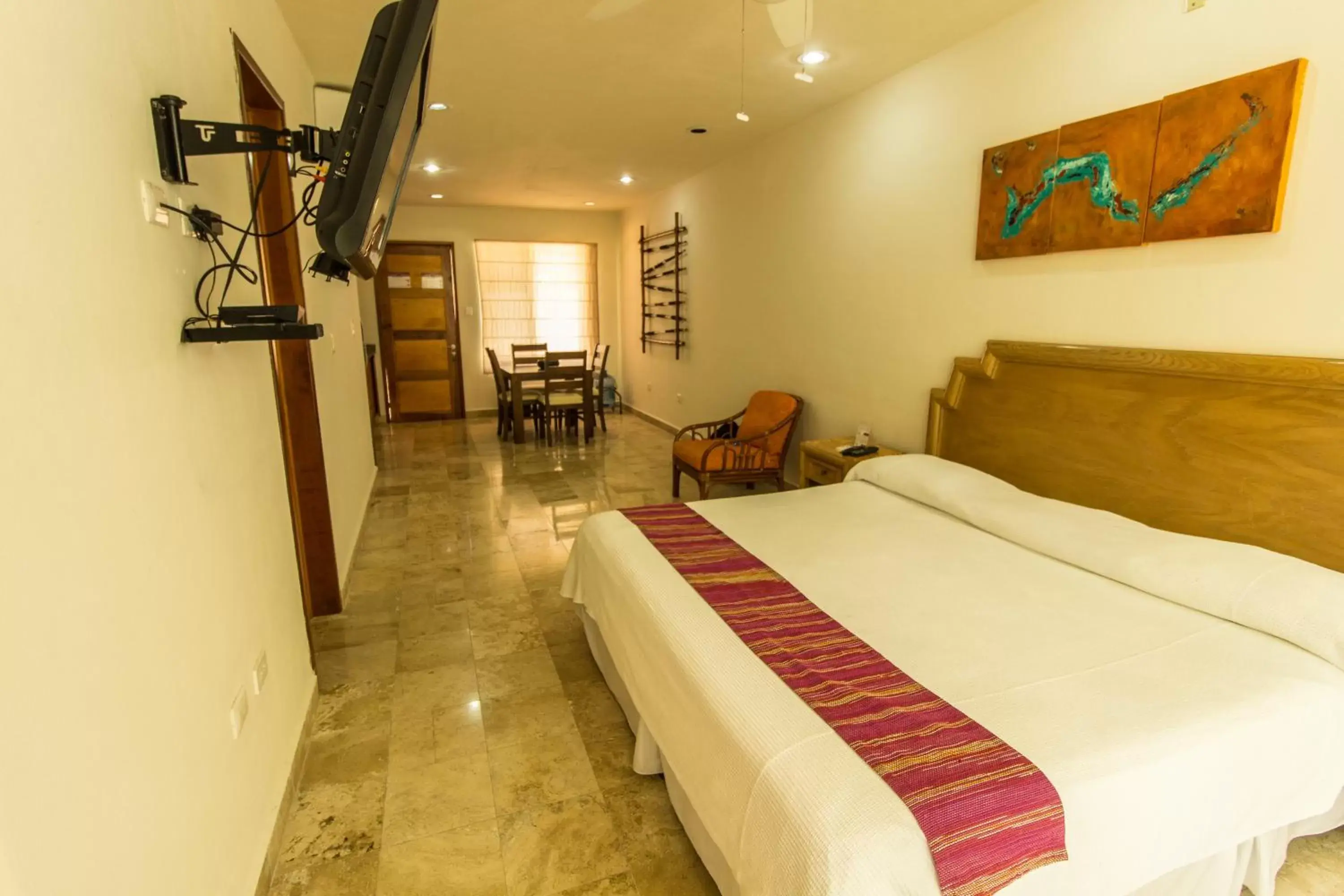Bedroom in Coral Maya Stay Suites