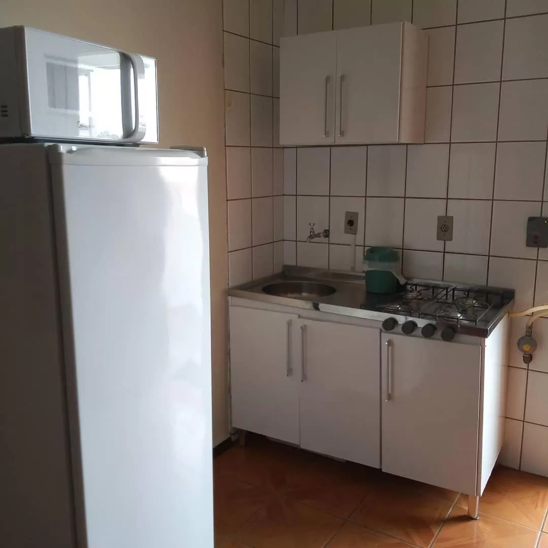 Kitchen or kitchenette in Pousada Japeju