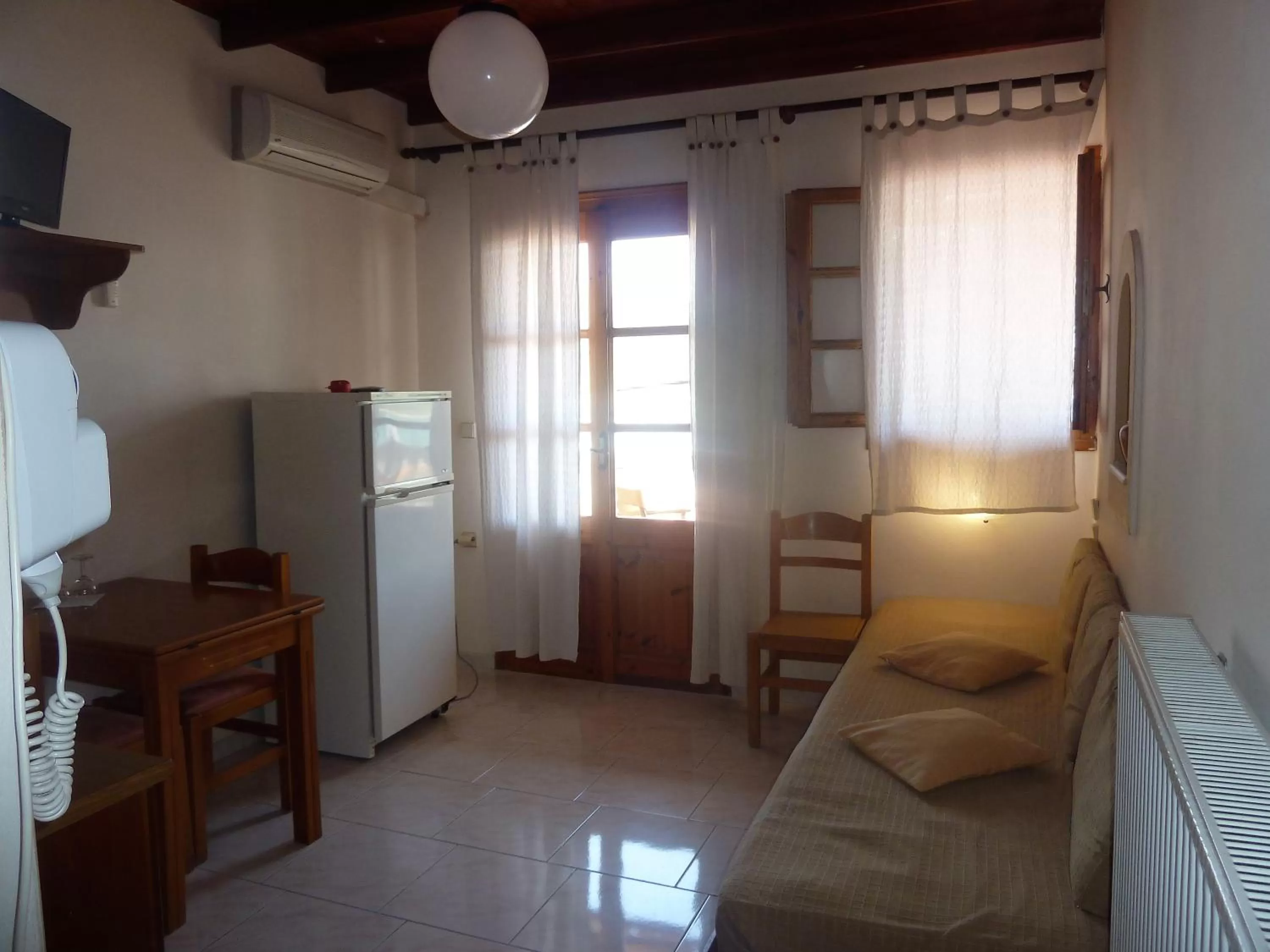 Kitchen or kitchenette in Zoe Pension