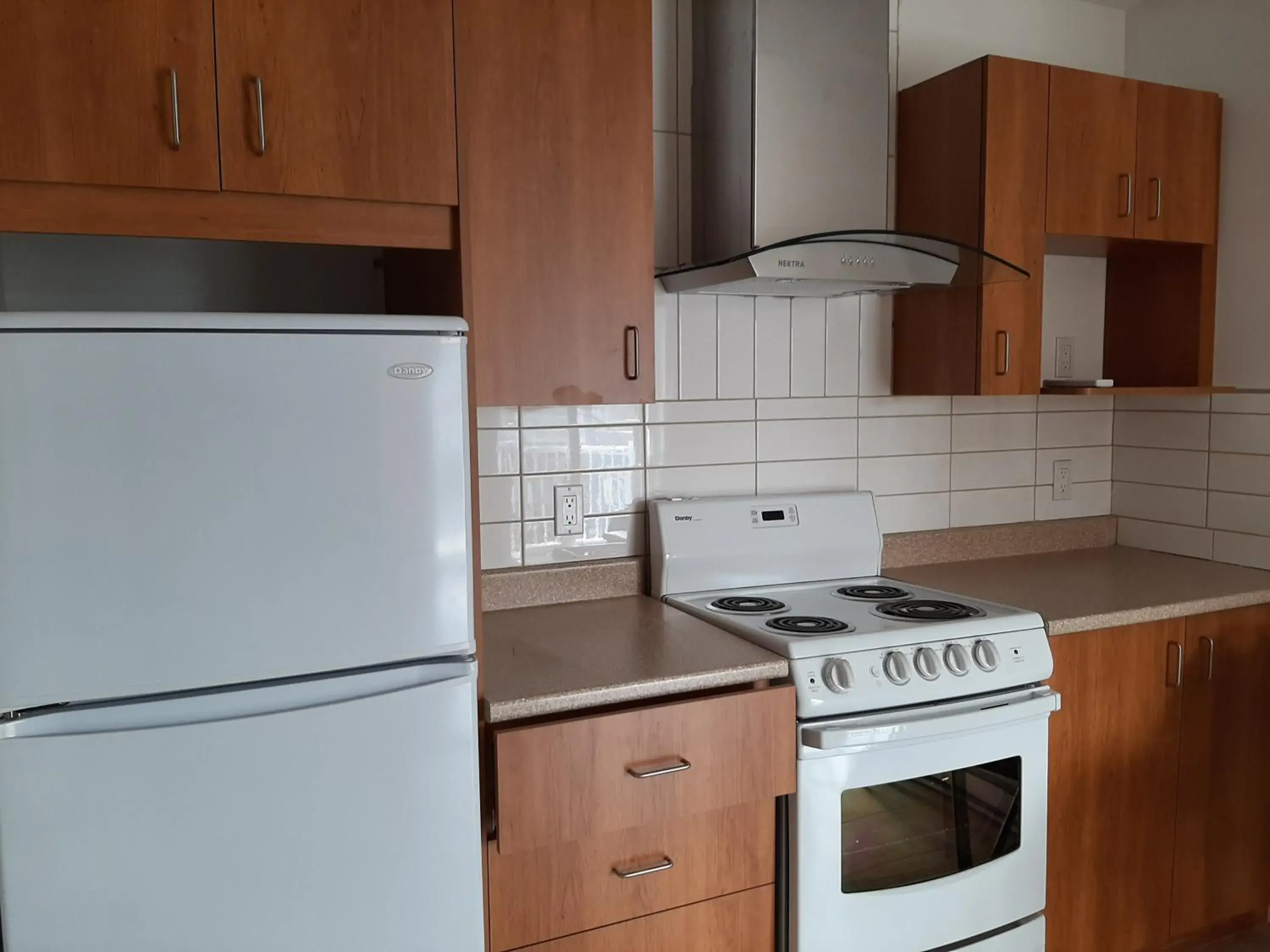 Kitchen/Kitchenette in Auberge Motel LA RÉFÉRENCE