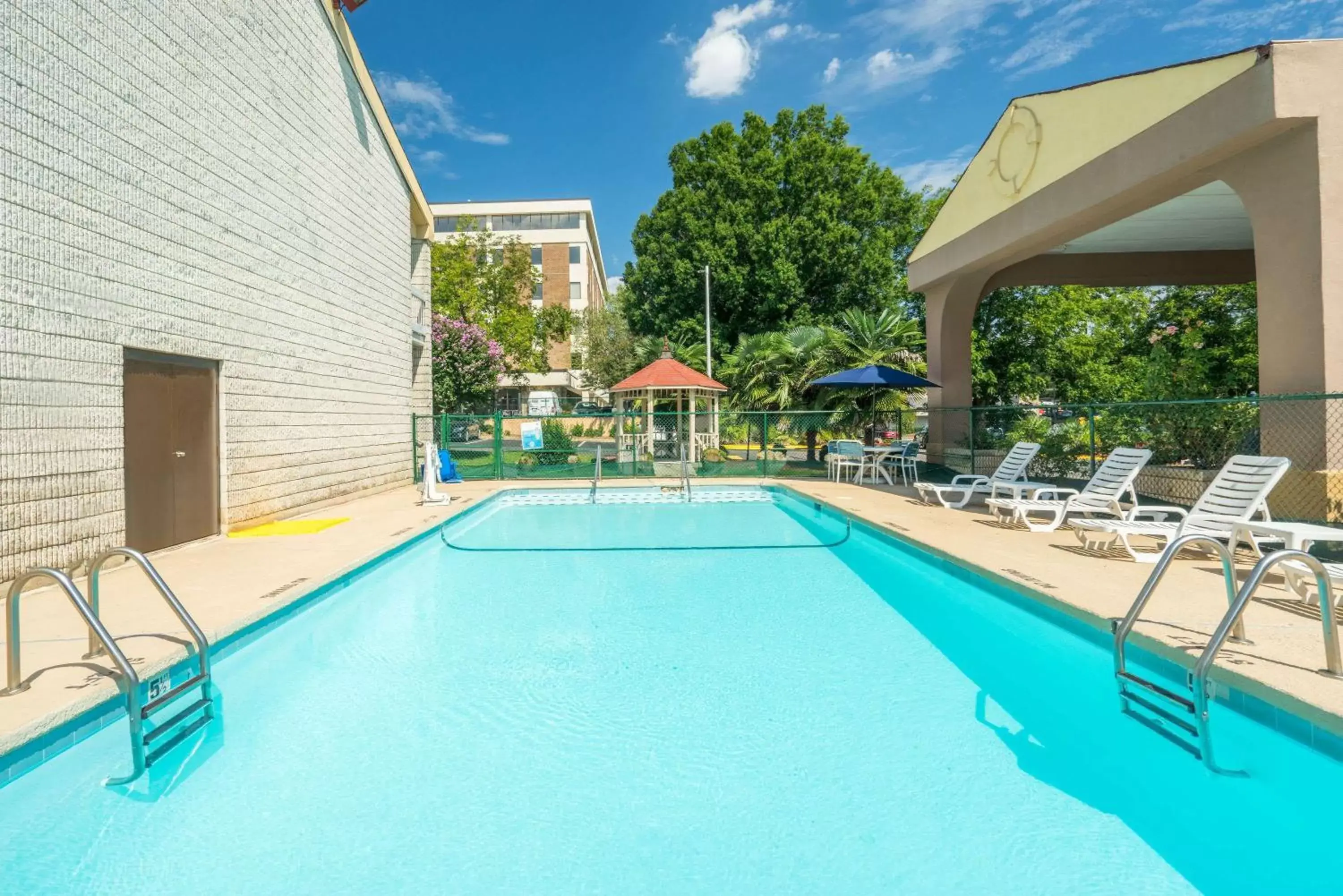 On site, Swimming Pool in Days Inn by Wyndham Raleigh Midtown