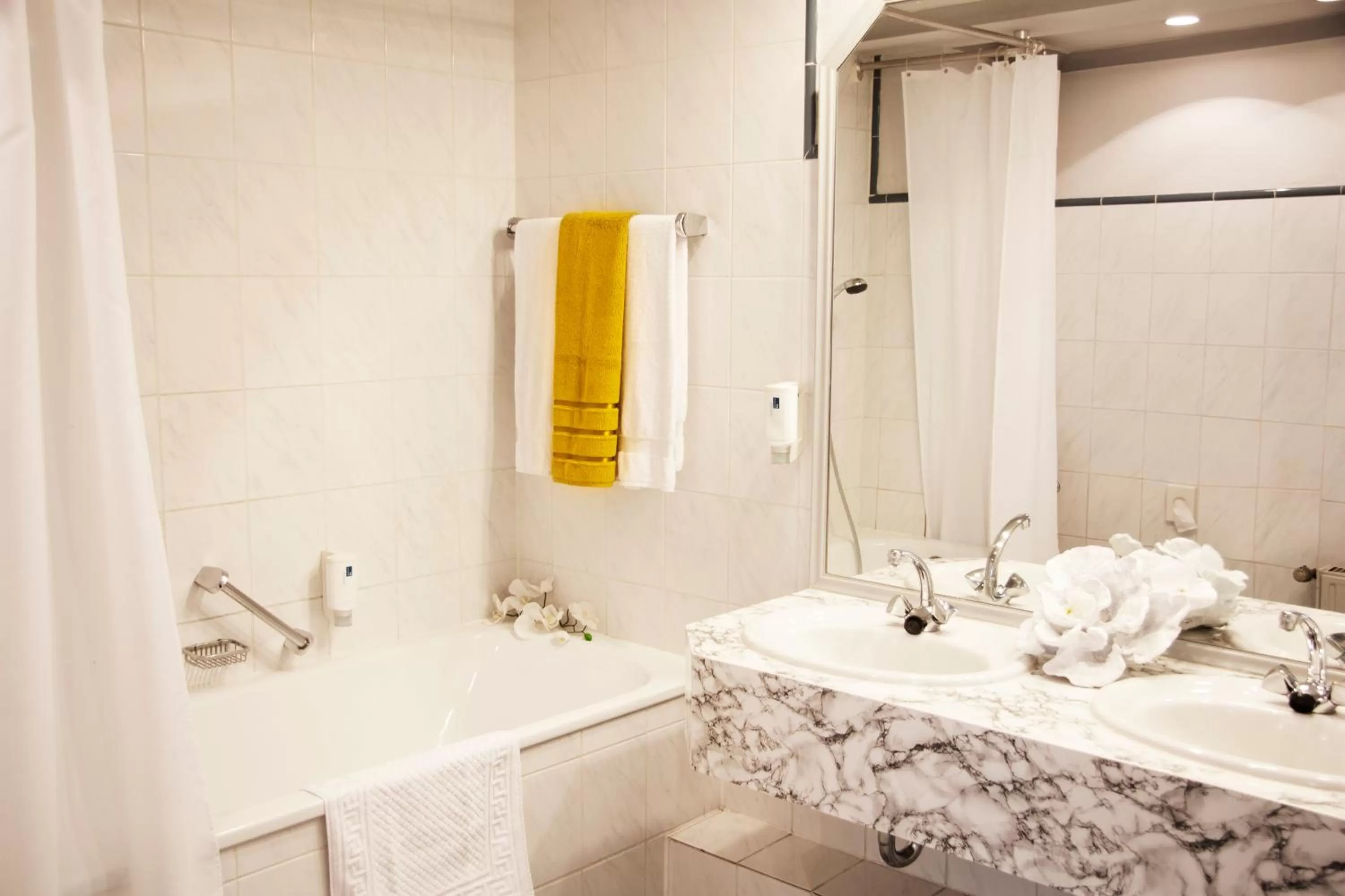 Bathroom in INA Hotel Royal