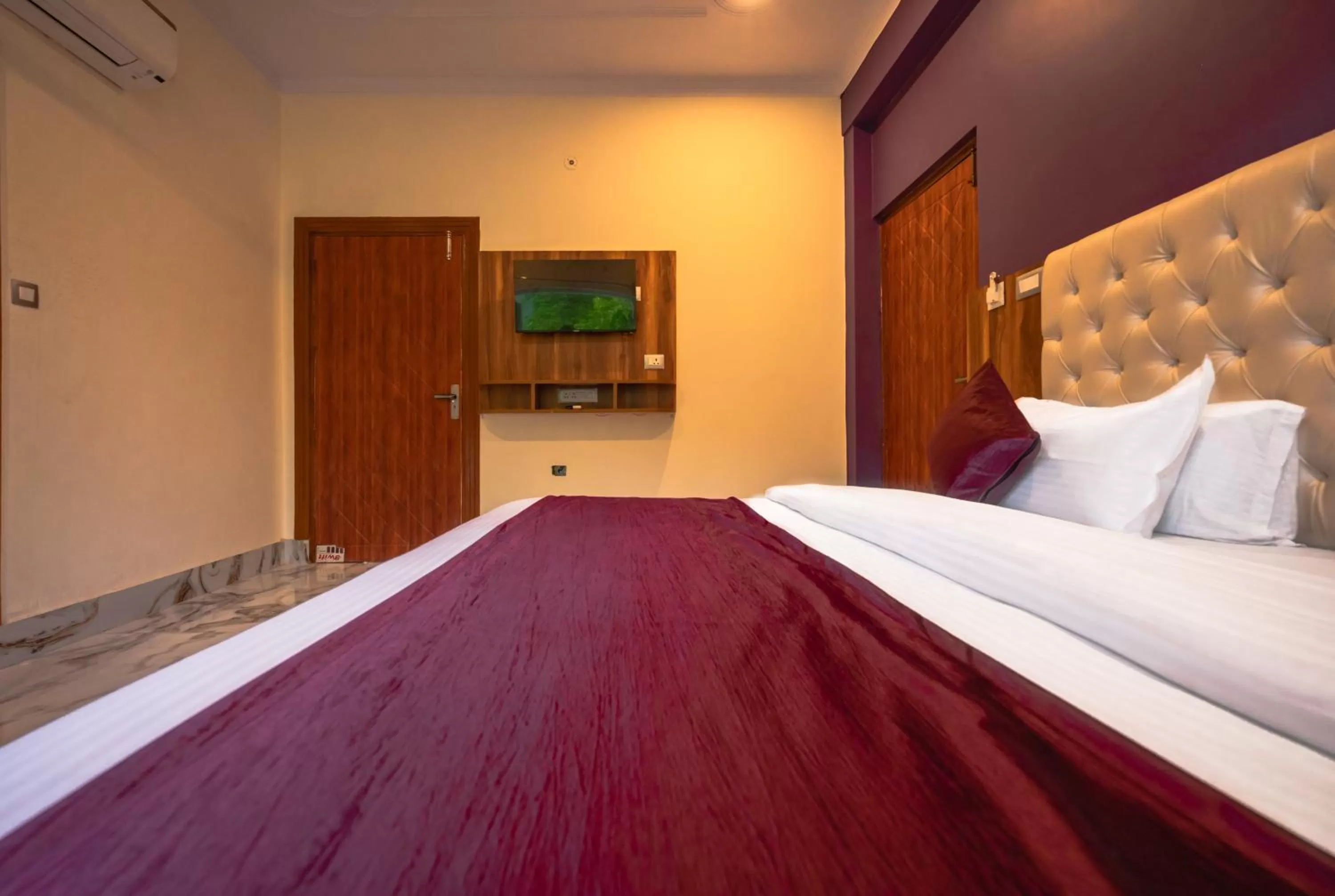 Bed in Hotel Rishikesh Grand by Kool Stays