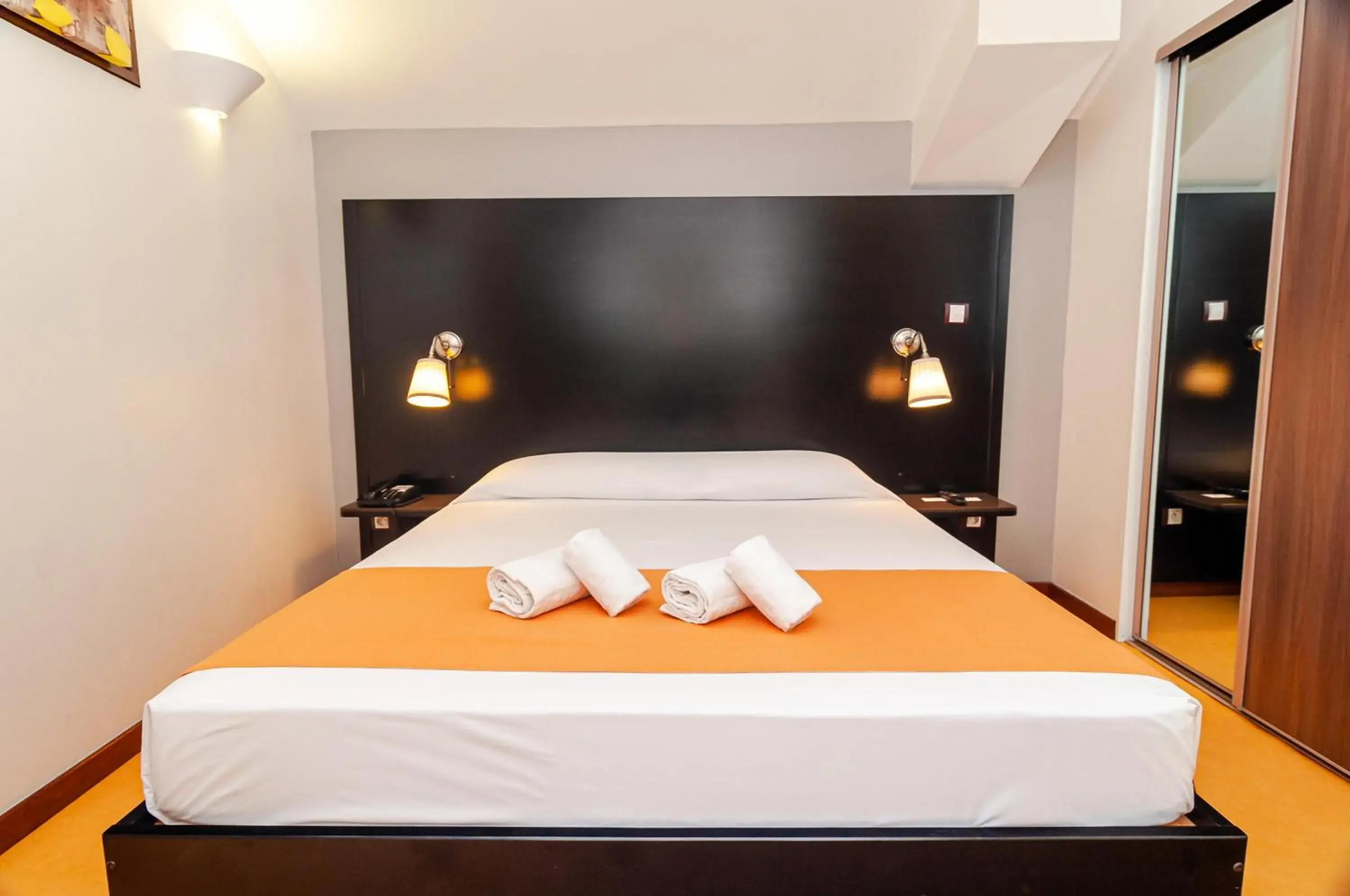 Bed in Tama Hotel Bed in Tama Hotel