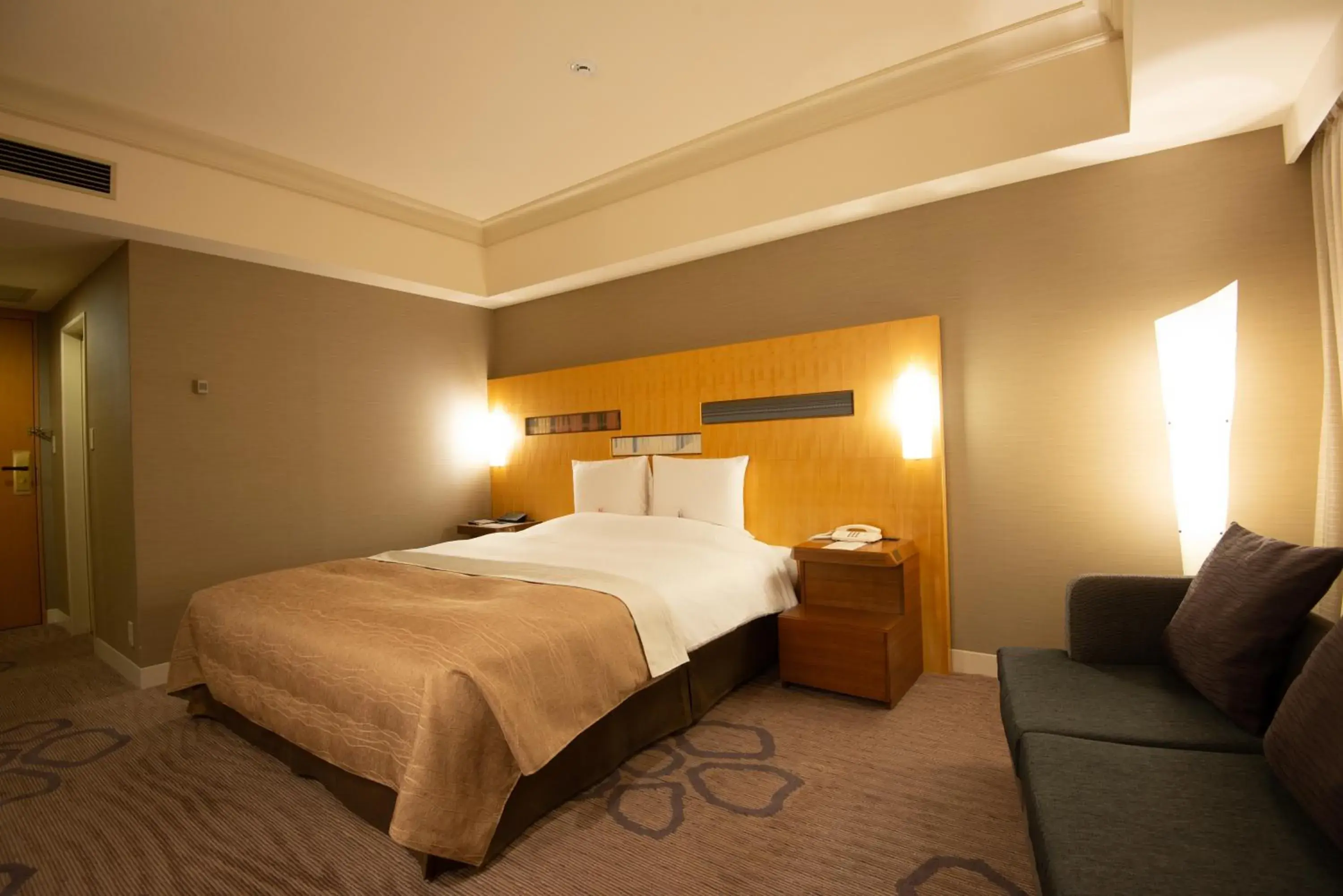 Photo of the whole room, Bed in Hotel Okura Fukuoka Photo of the whole room, Bed in Hotel Okura Fukuoka