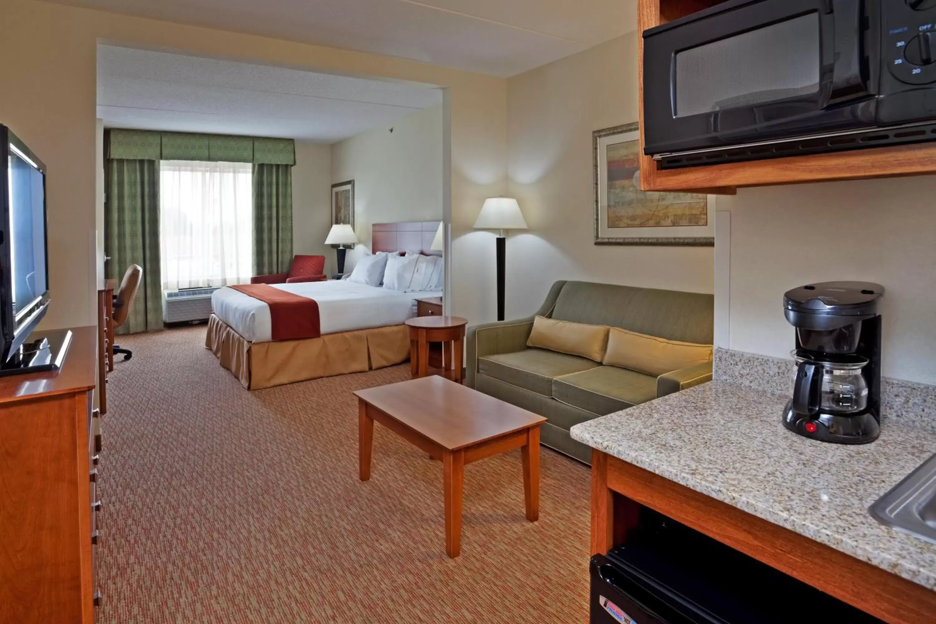 Bedroom in Holiday Inn Express Hotel & Suites Greensboro - Airport Area, an IHG Hotel