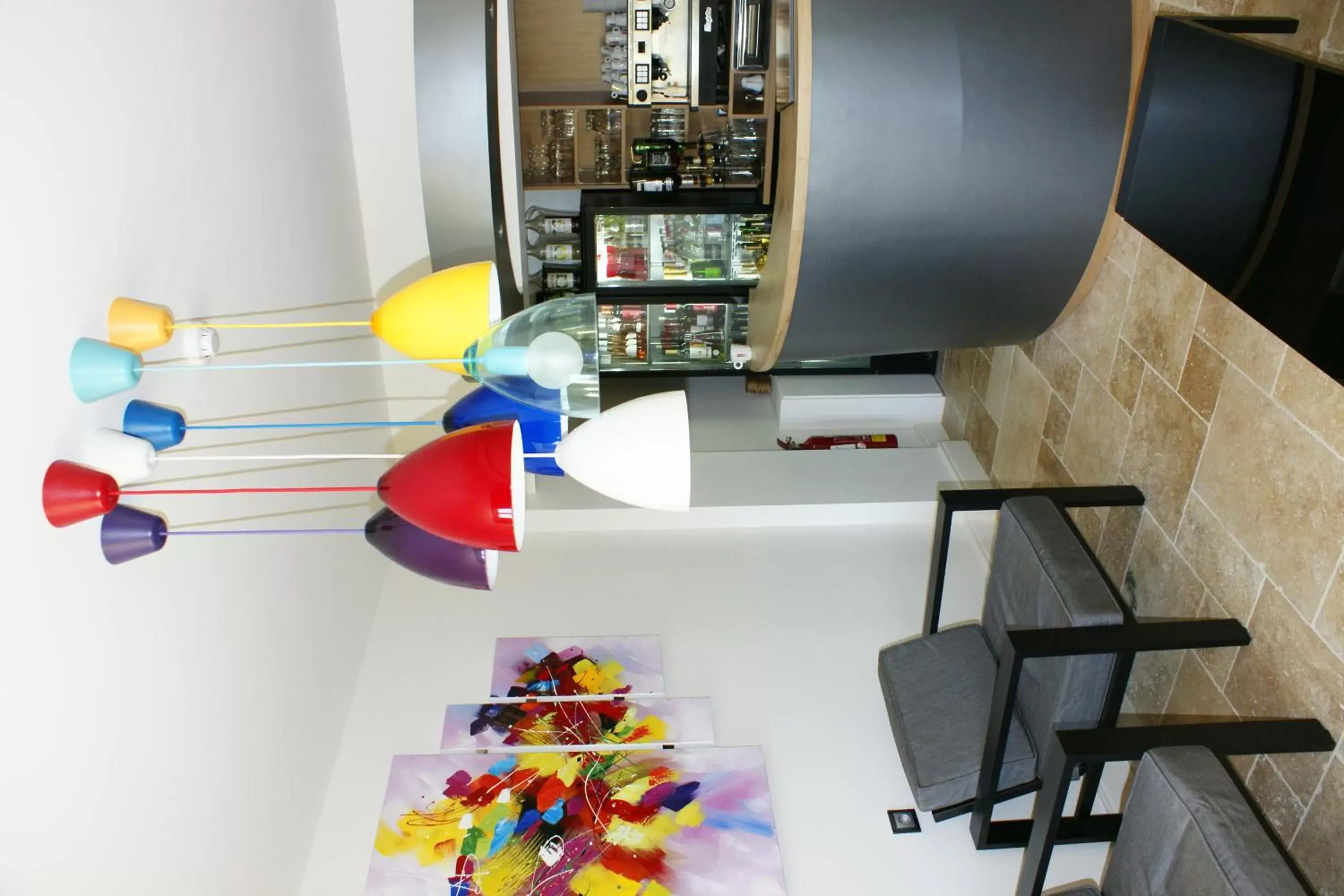 Lounge or bar in Logis- Hôtel Spa Restaurant l'Epicurial Lounge or bar in Logis- Hôtel Spa Restaurant l'Epicurial