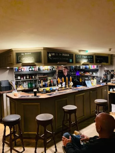 Lounge or bar in The Compasses Inn