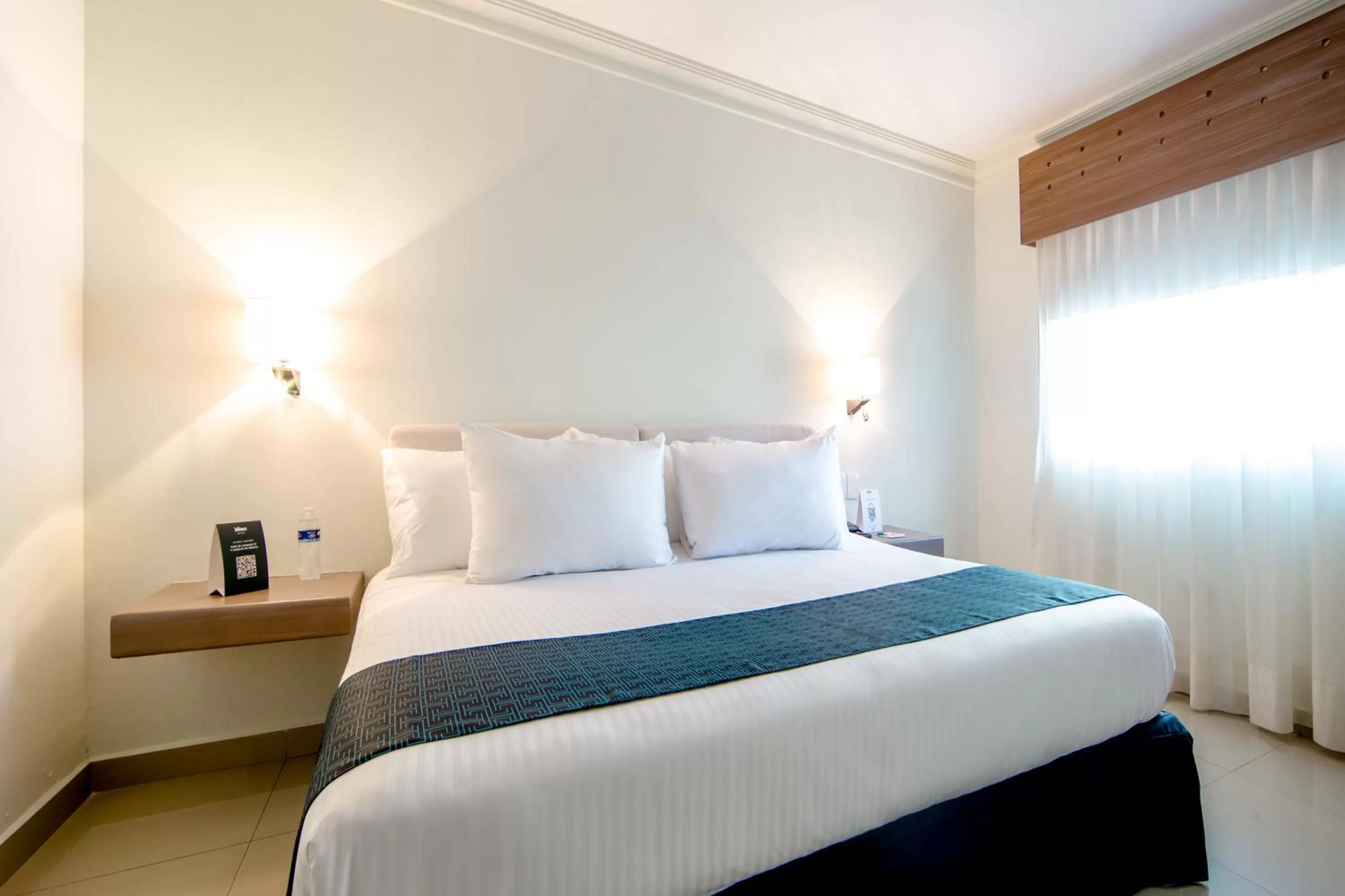 Bed in InHouse Hotel Culiacán