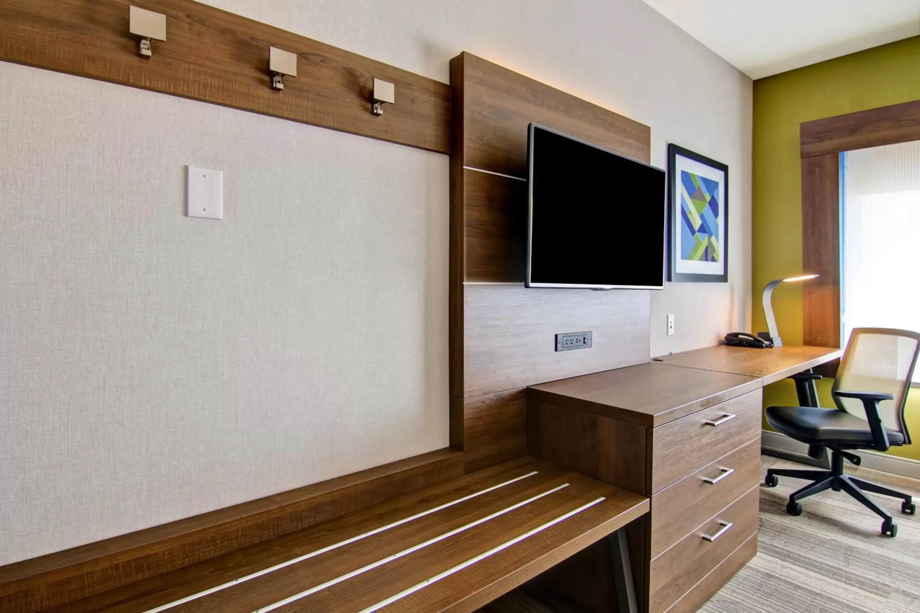 Photo of the whole room, TV/Entertainment Center in Holiday Inn Express Hotel & Suites Toronto - Markham, an IHG Hotel