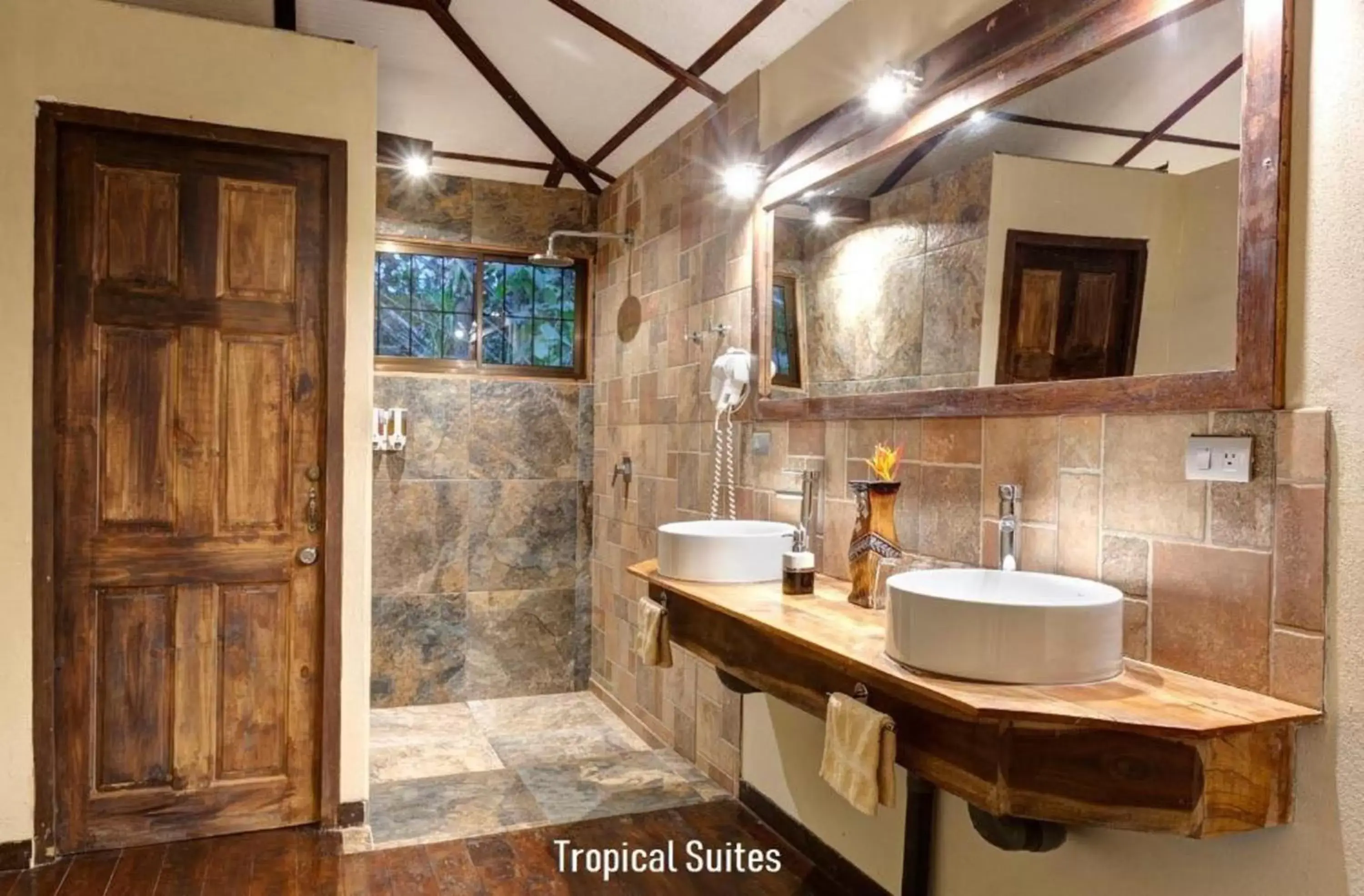 Bathroom in Tropical Suites & Villas