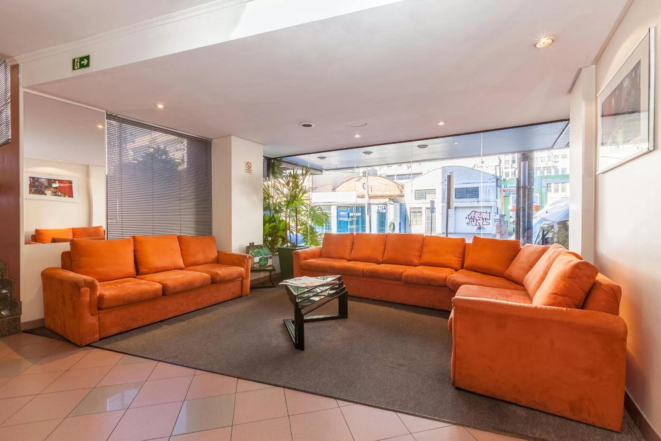 Communal lounge/ TV room, Seating Area in Tri Hotel Smart Caxias