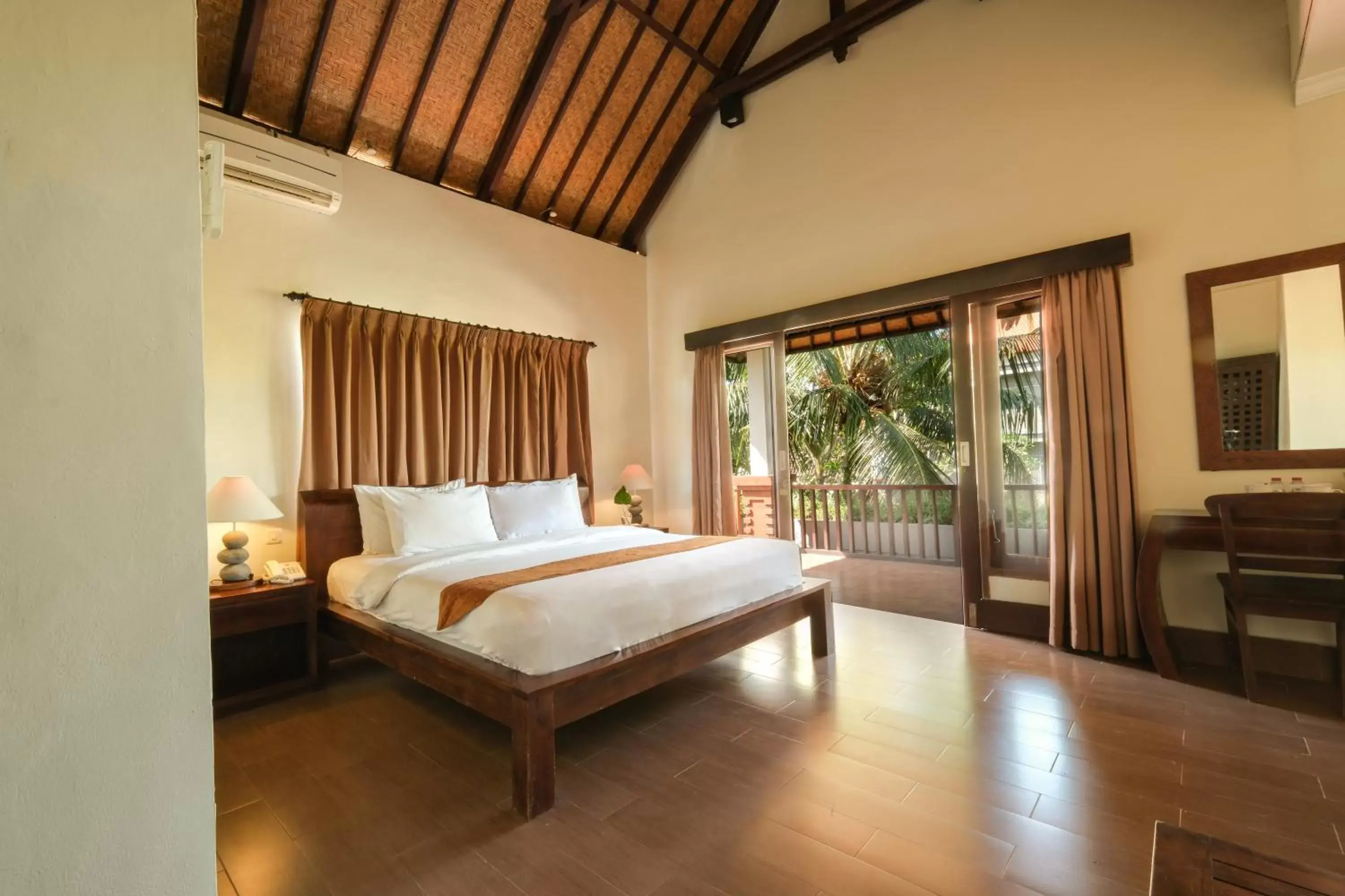 Photo of the whole room, Bed in Artini Bisma Ubud Hotel