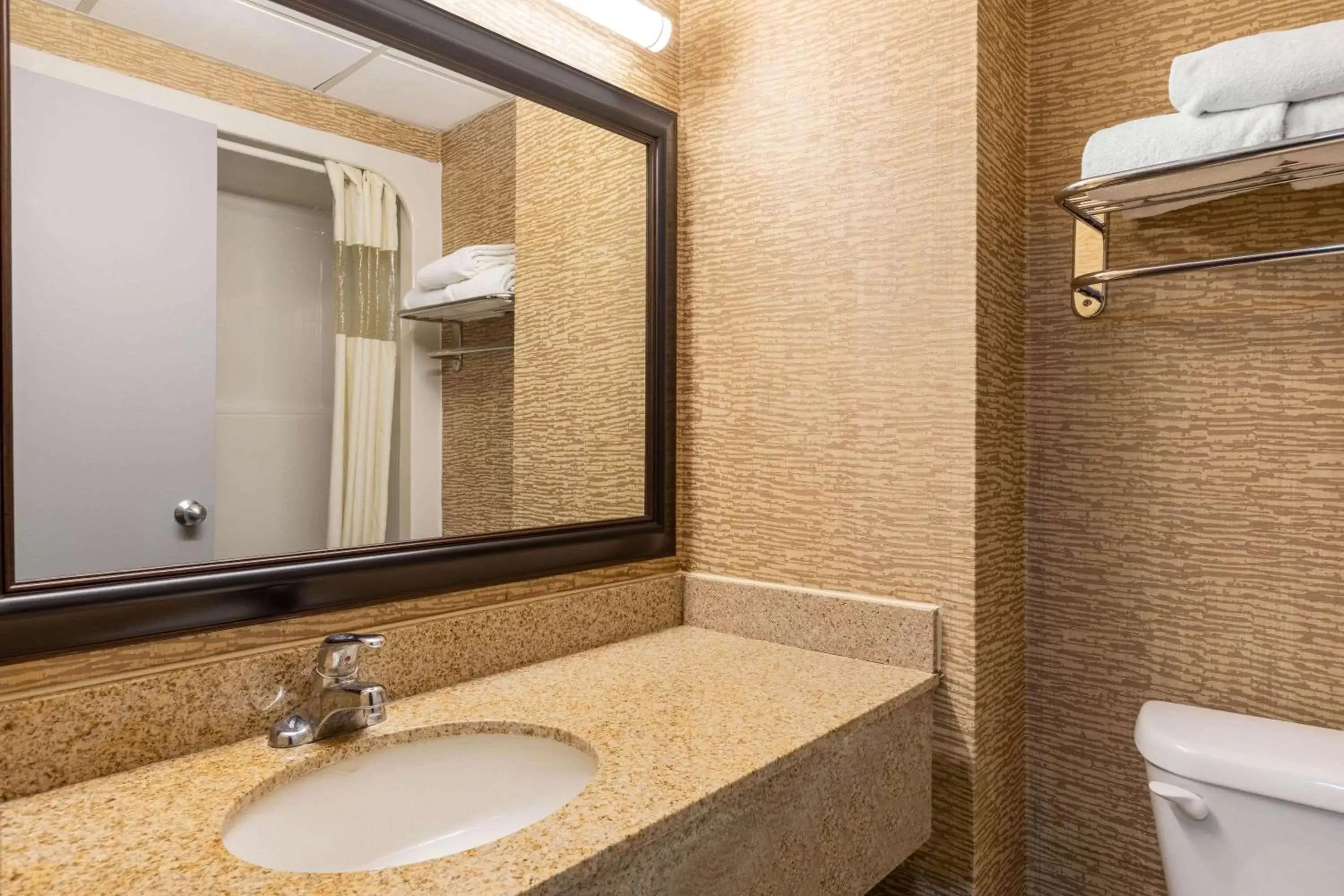 Bathroom in Howard Johnson by Wyndham Gillette