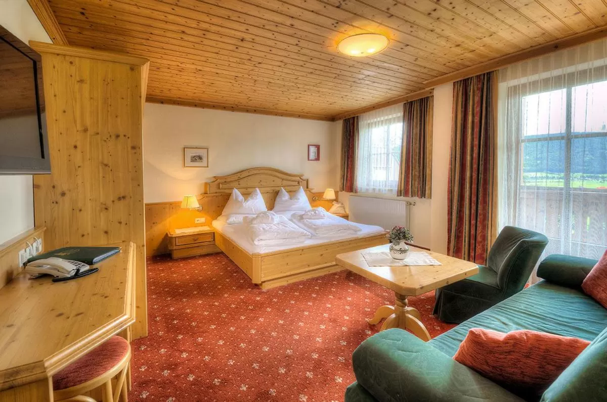 Photo of the whole room, Bed in Hotel Häuserl im Wald