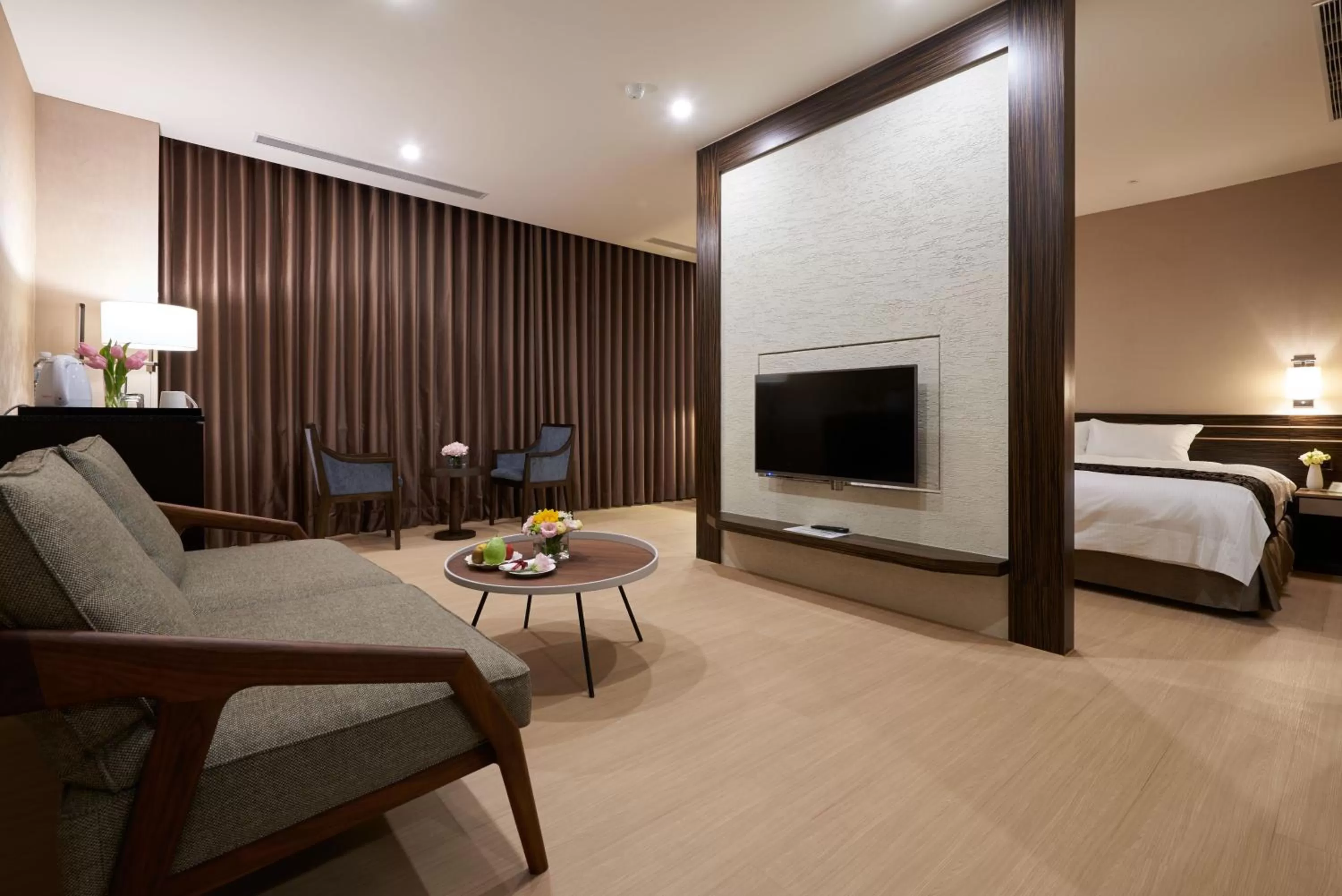 Living room, Bed in SOL Hotel