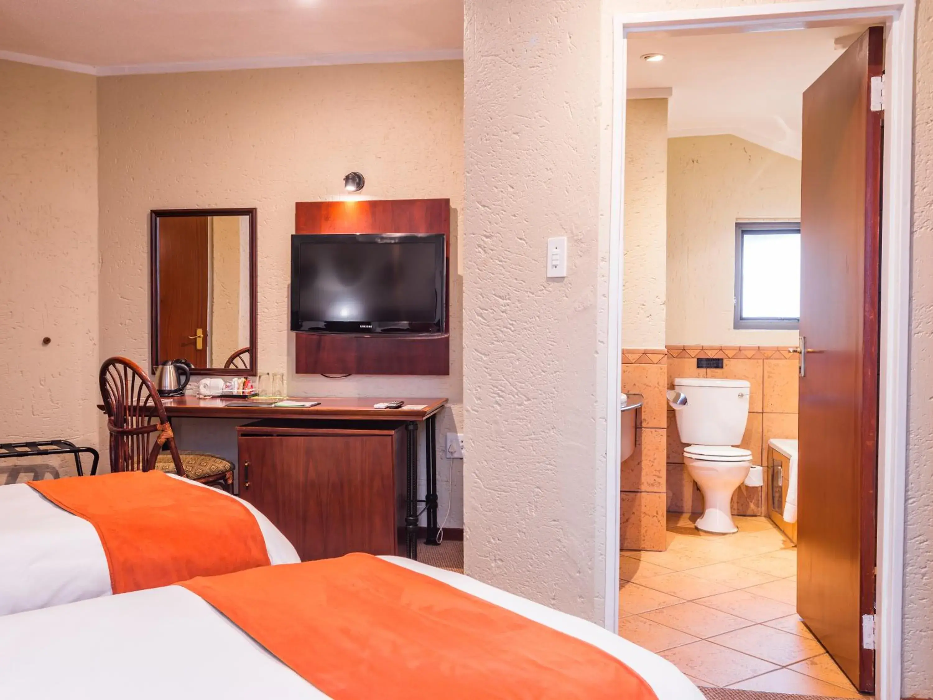 Bathroom, TV/Entertainment Center in aha Kopanong Hotel & Conference Centre