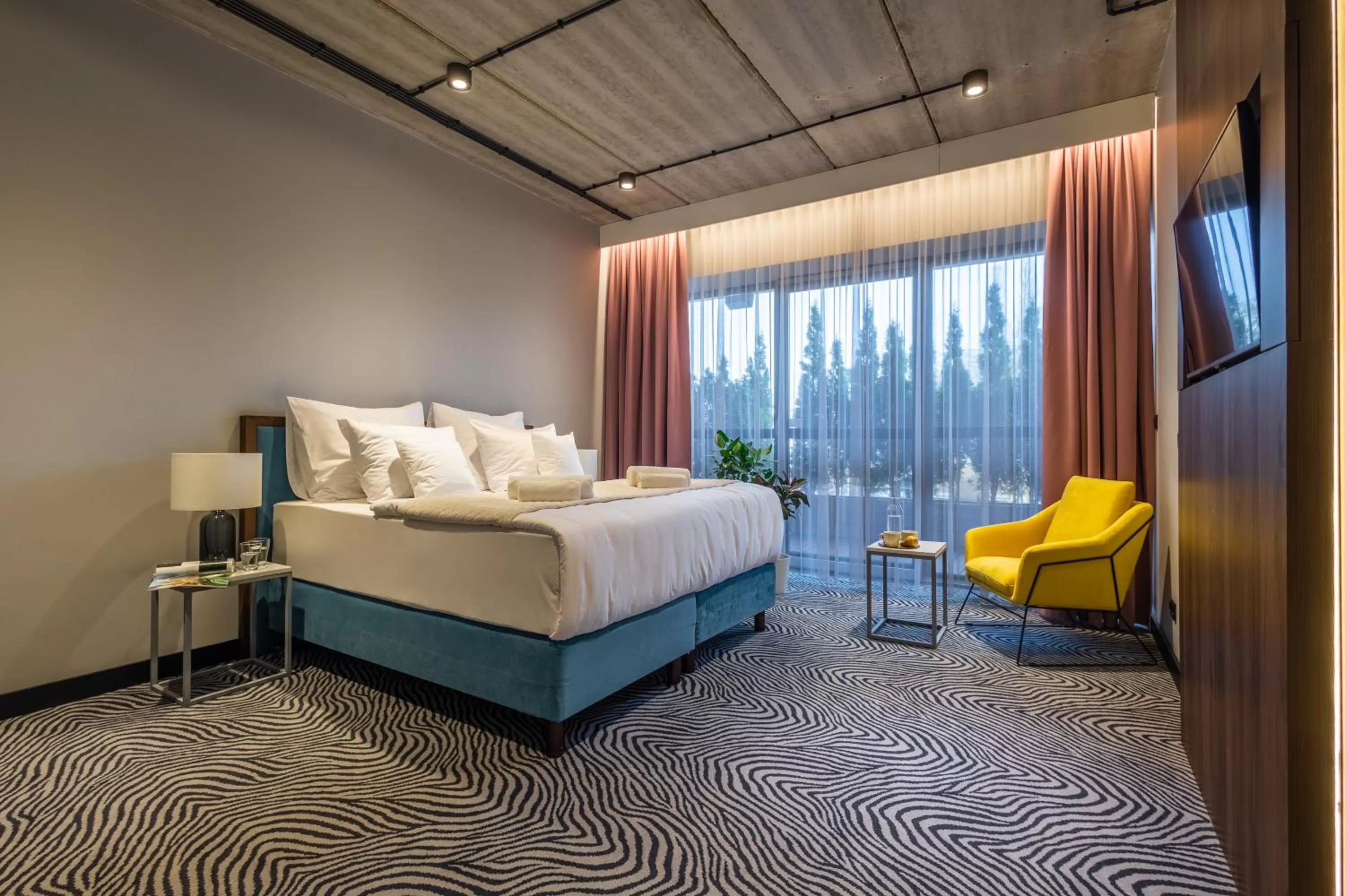 Bed in Hotel Zoo by Afrykarium Wroclaw