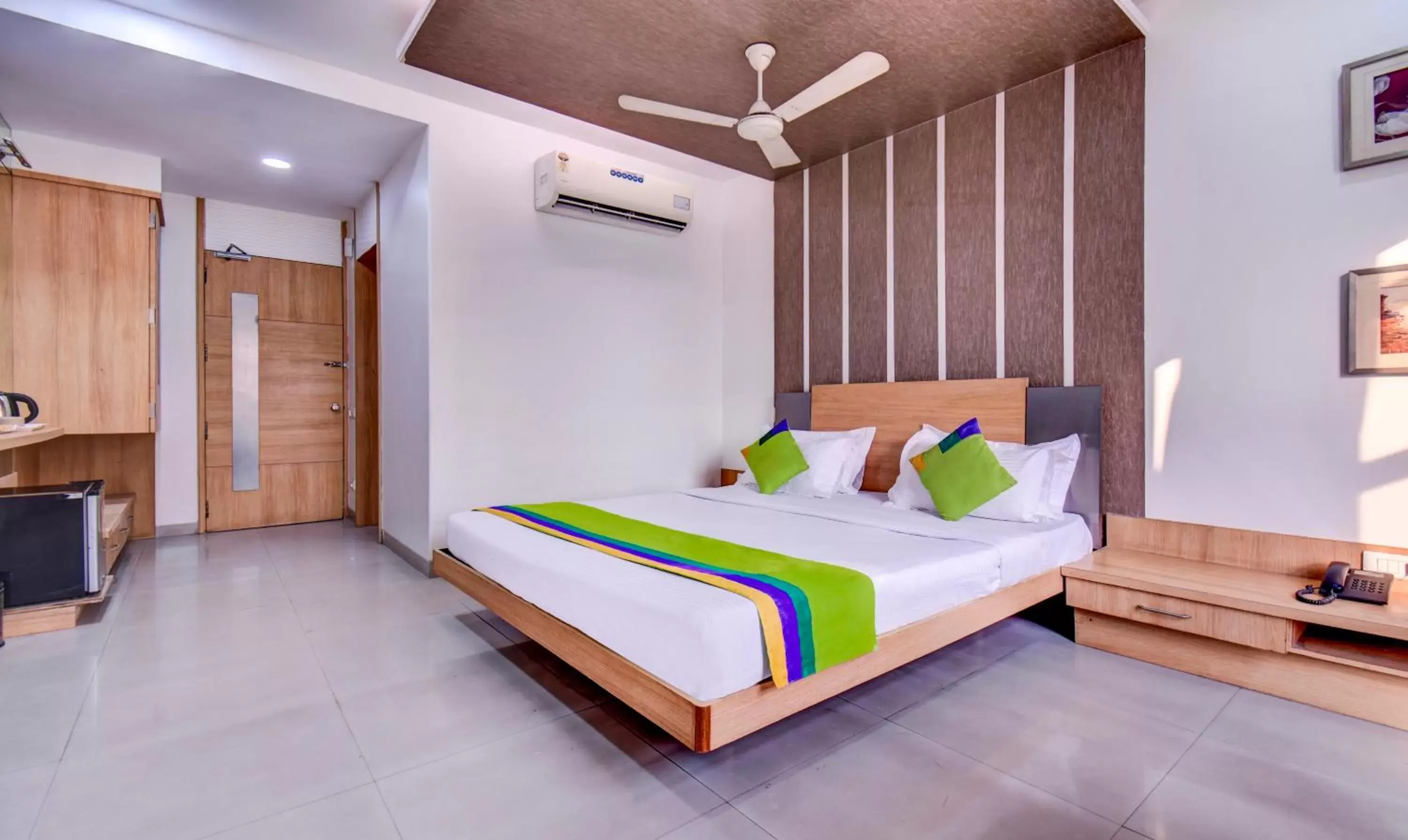 Photo of the whole room, Bed in Treebo Trend Admiral Suites New Usmanpura