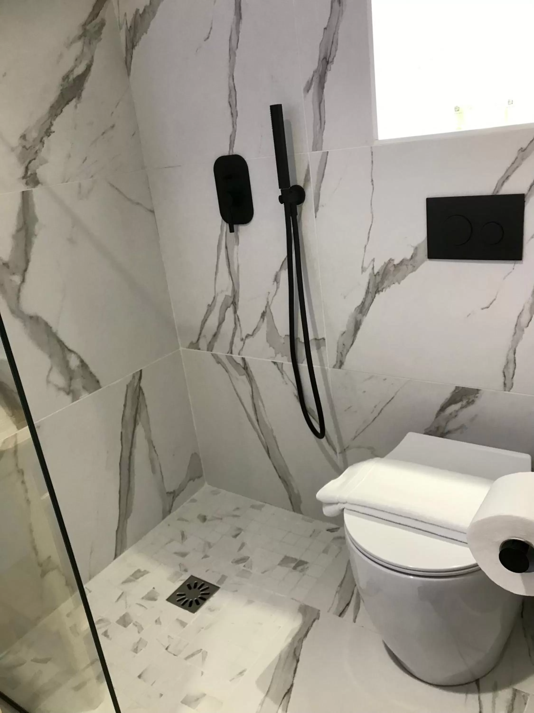 Bathroom in VASILIKON Hotel 1888 the past is present HISTORICAL PRESERVATION MONUMENT