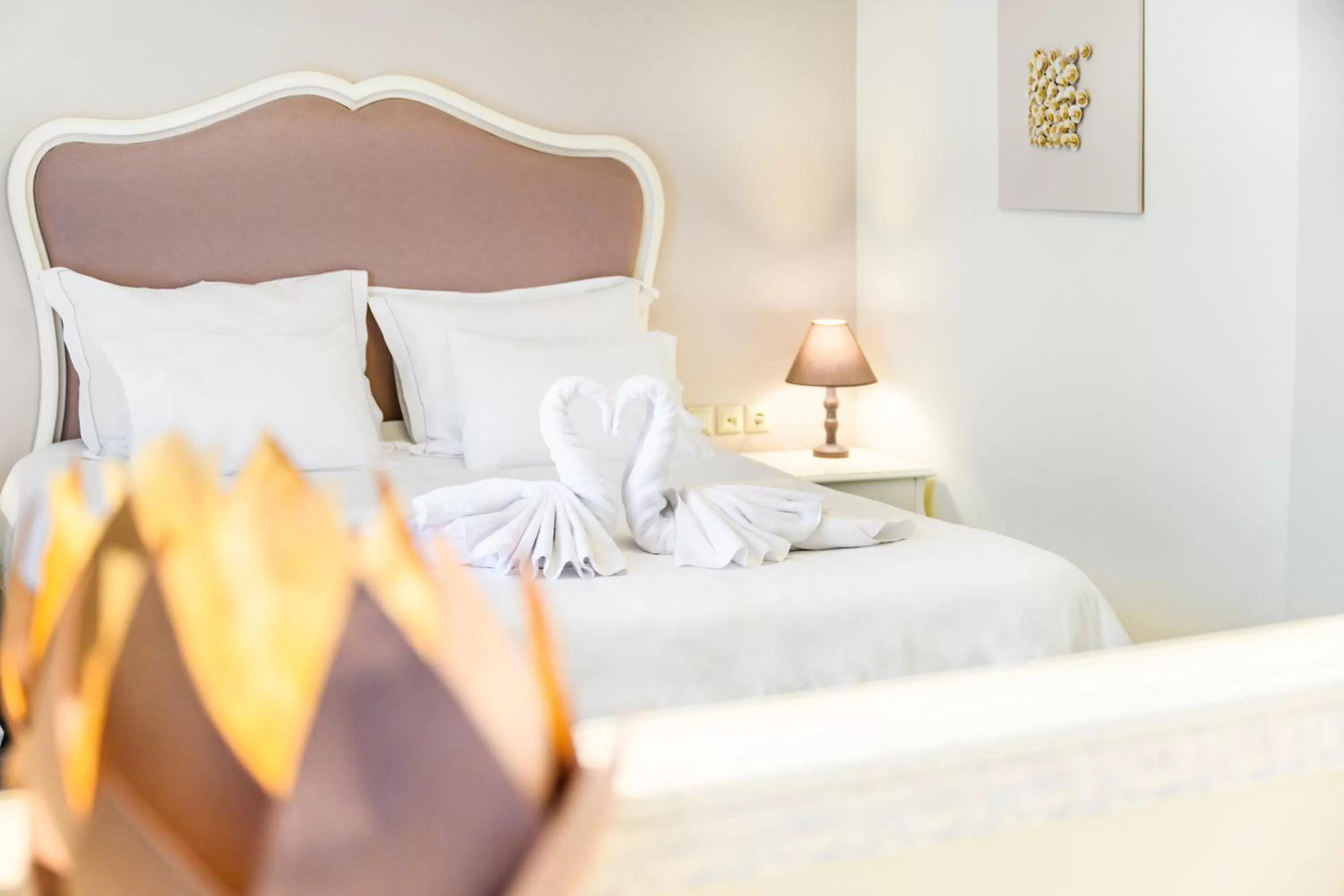 Bed in Emerald Suites