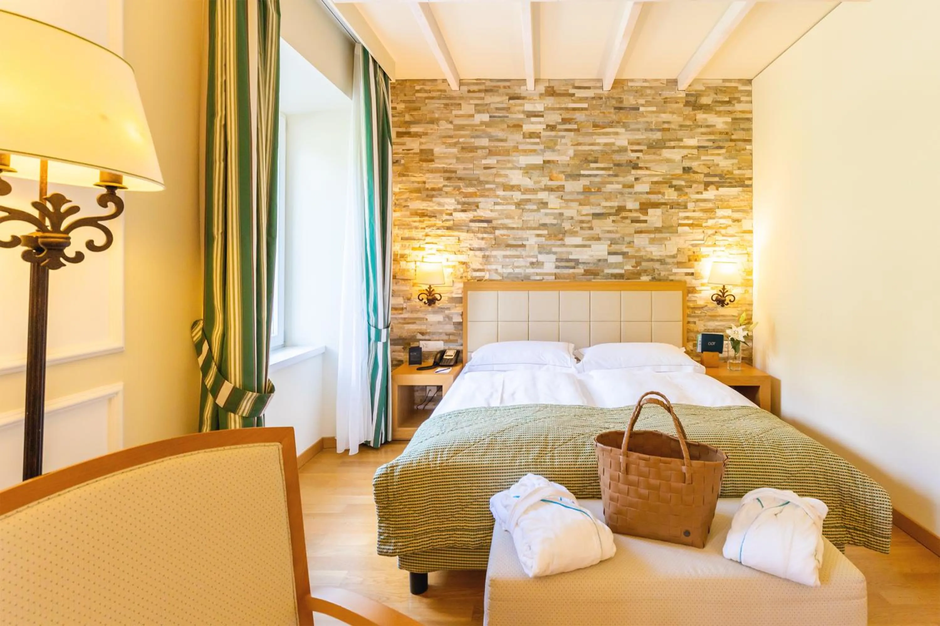 Bedroom, Bed in Kurhaus Cademario Hotel & SPA - Adults Only