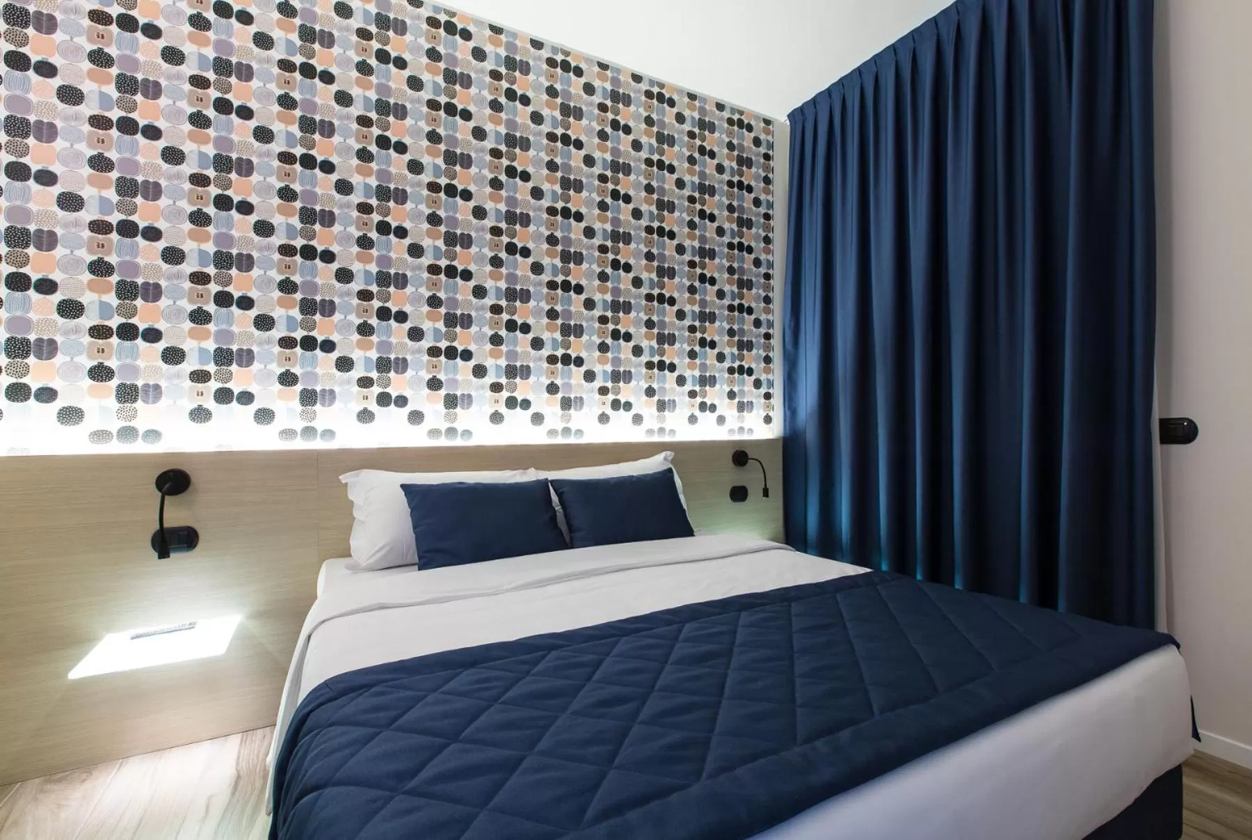 Bed in Aparthotel Isola