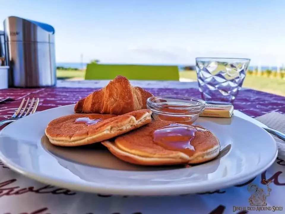 Breakfast in B&B L'EDEN DI CAPO BIANCO