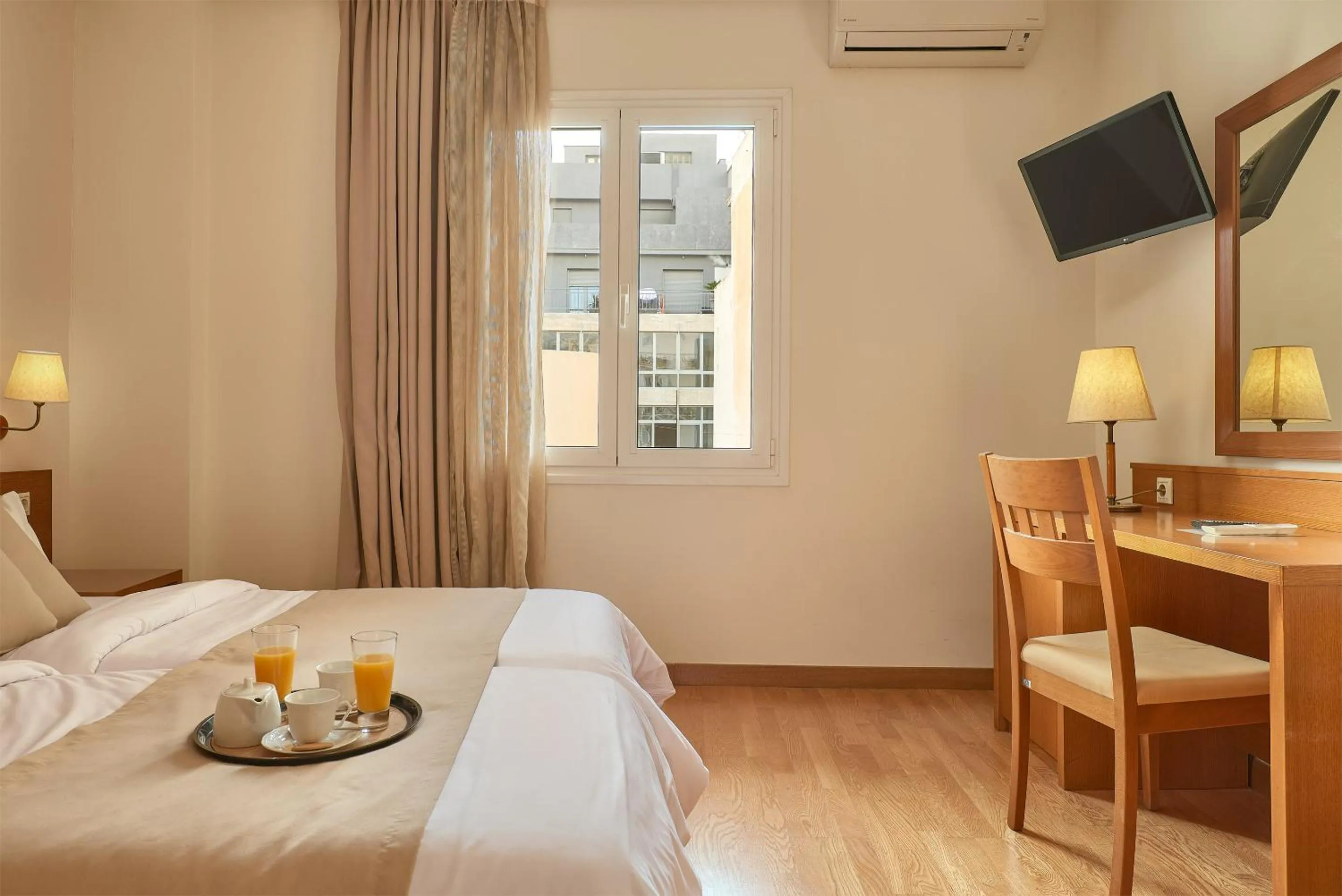 TV and multimedia, Bed in Athos Hotel