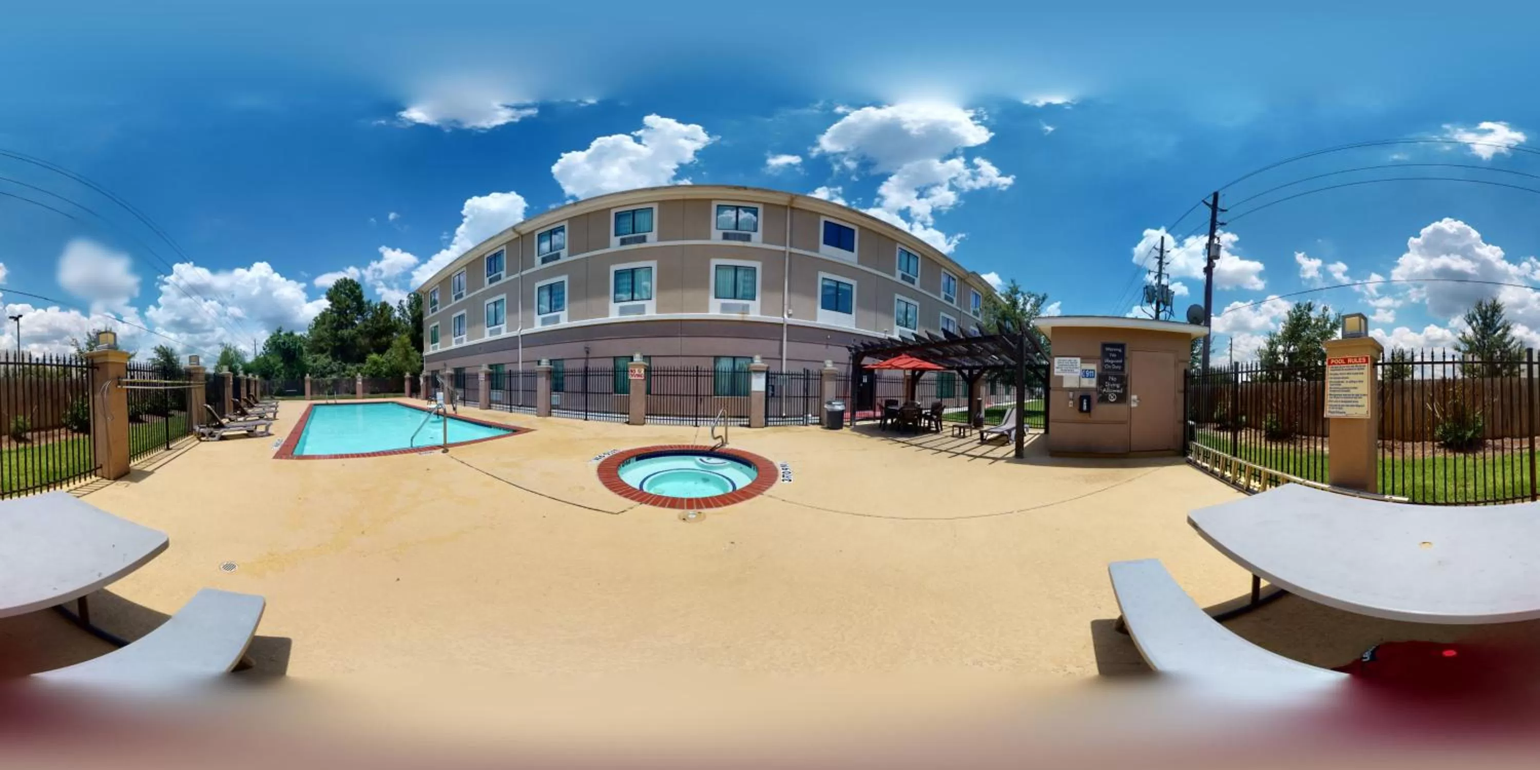 Pool view in Restwell Inn & Suites I-45 North