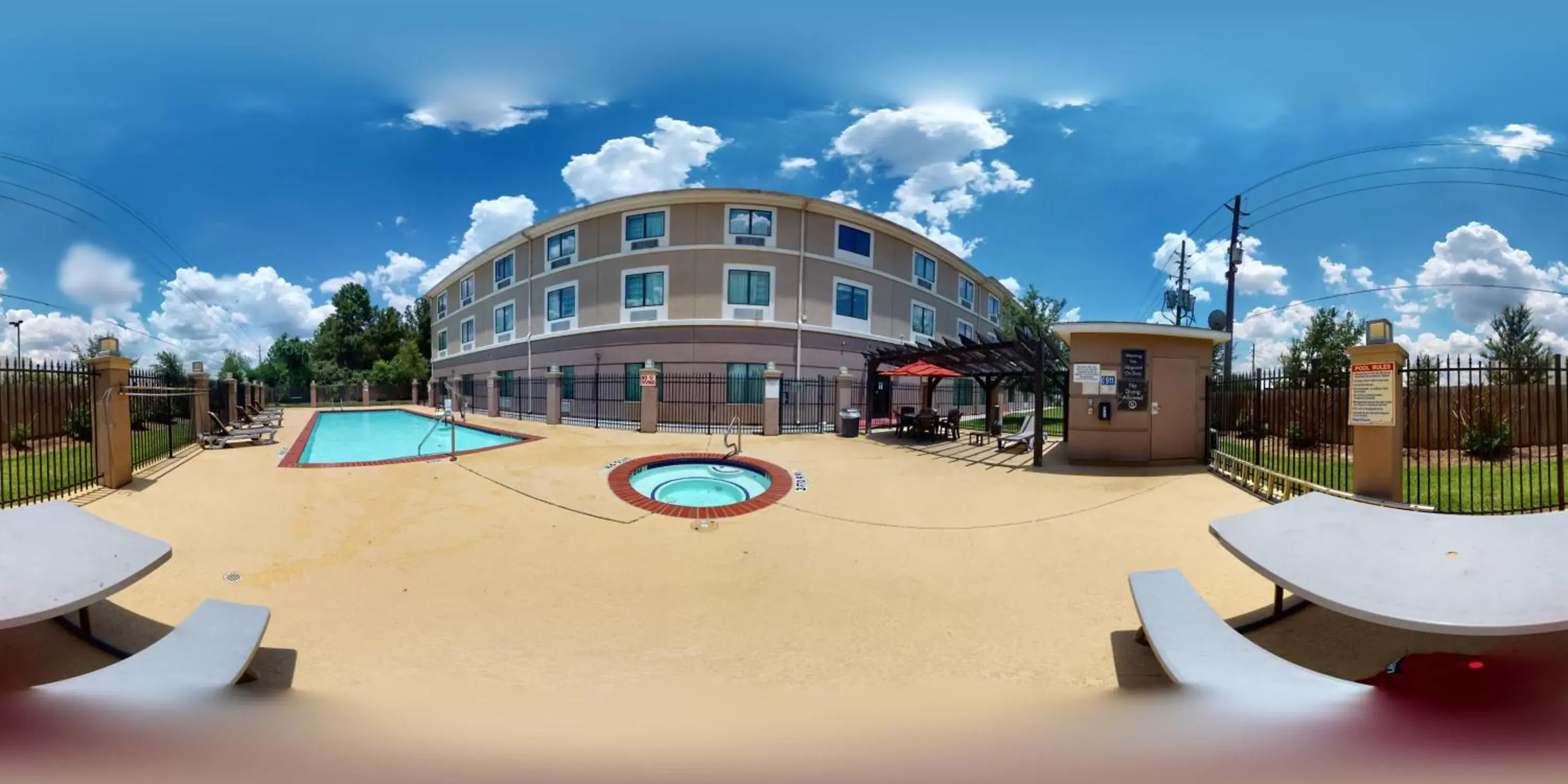 Pool view, Property Building in Restwell Inn & Suites I-45 North
