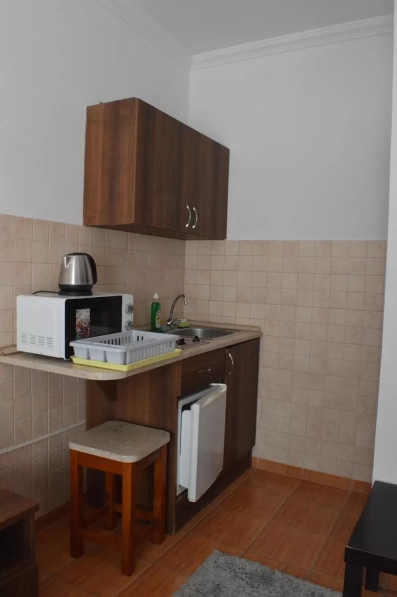 Kitchen/Kitchenette in Aqua Oazis Apartman