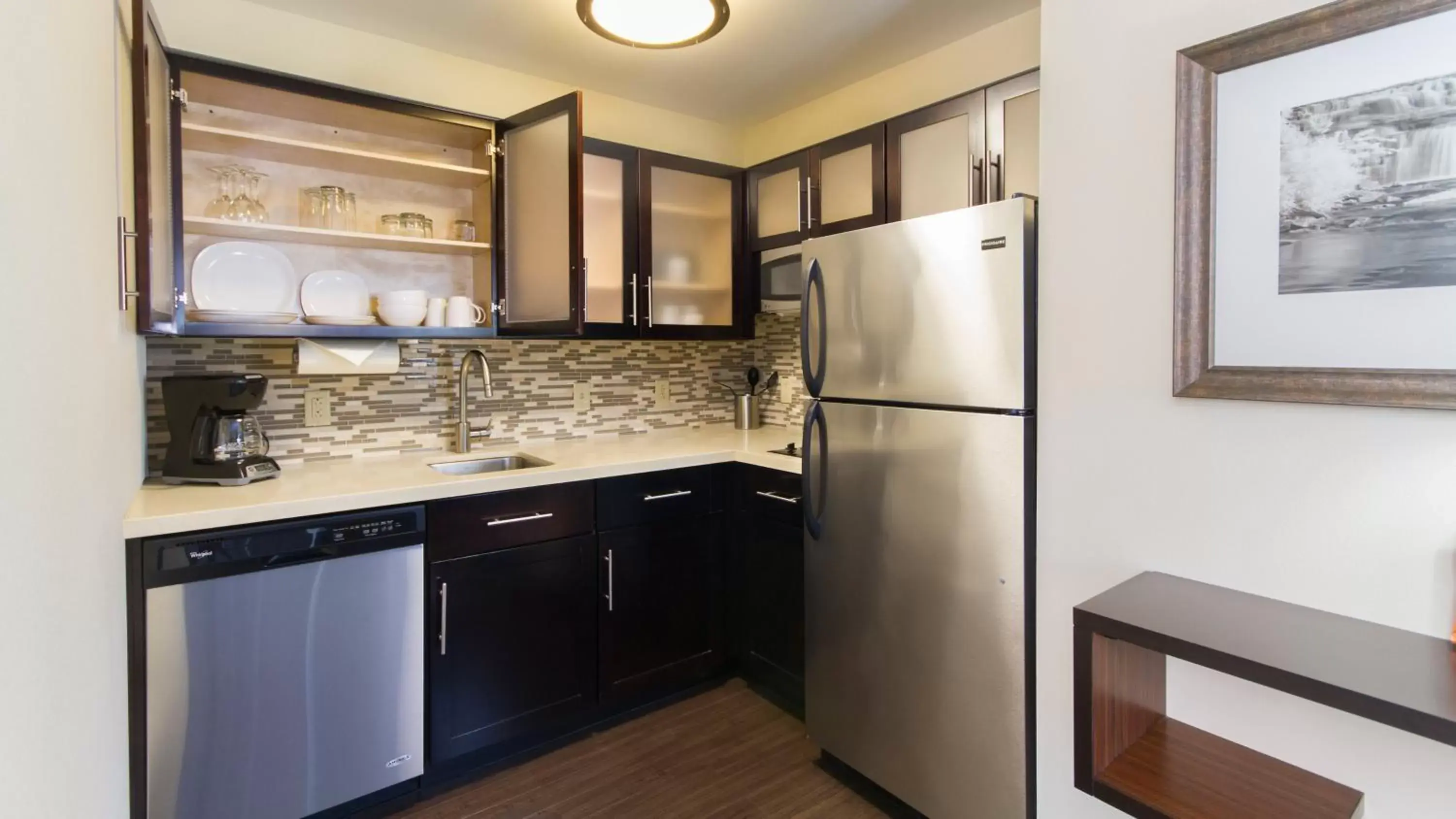 Photo of the whole room, Kitchen/Kitchenette in Staybridge Suites Buffalo-Amherst, an IHG Hotel