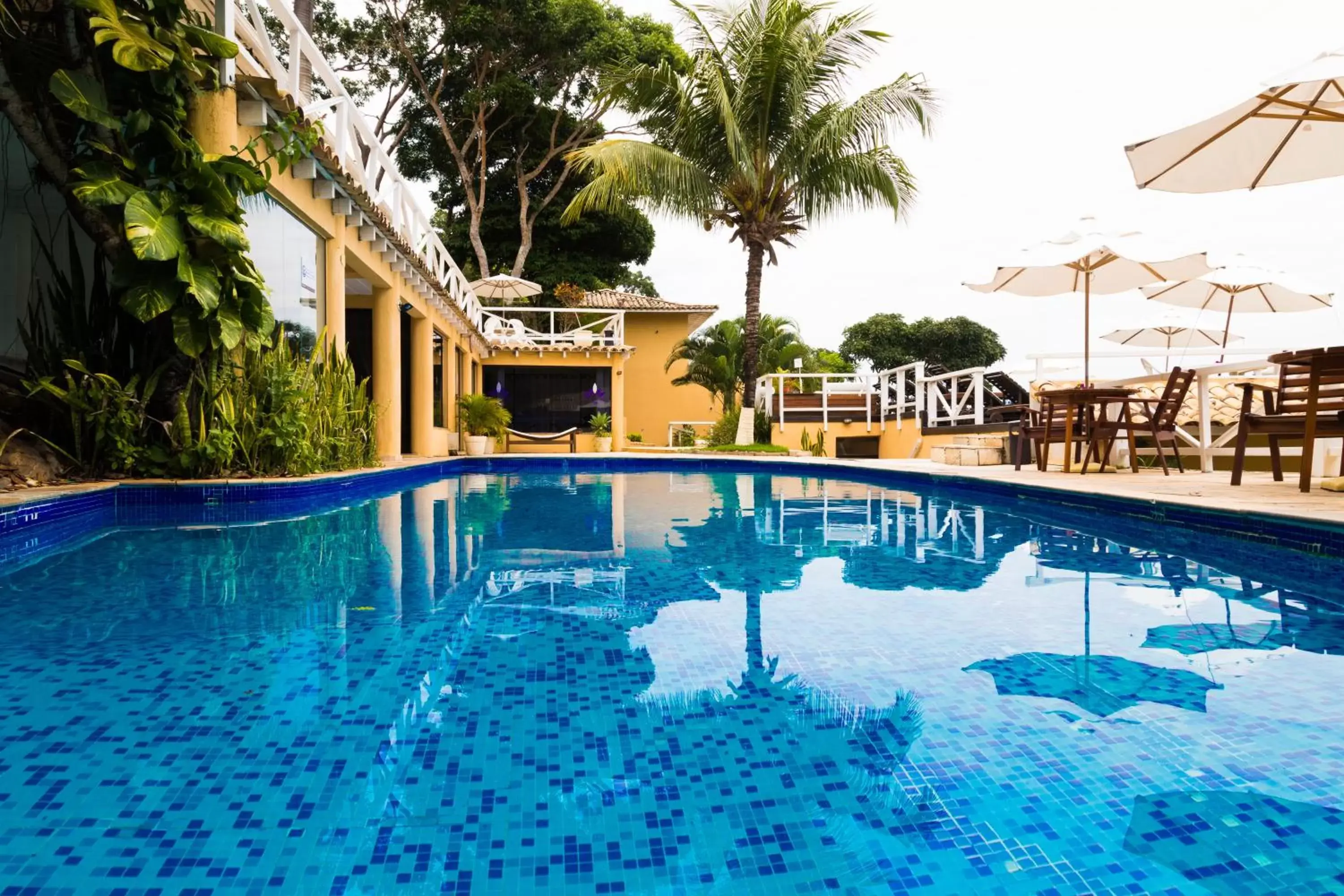 Swimming pool in Pousada e Spa Villa Mercedes by Latitud Hoteles