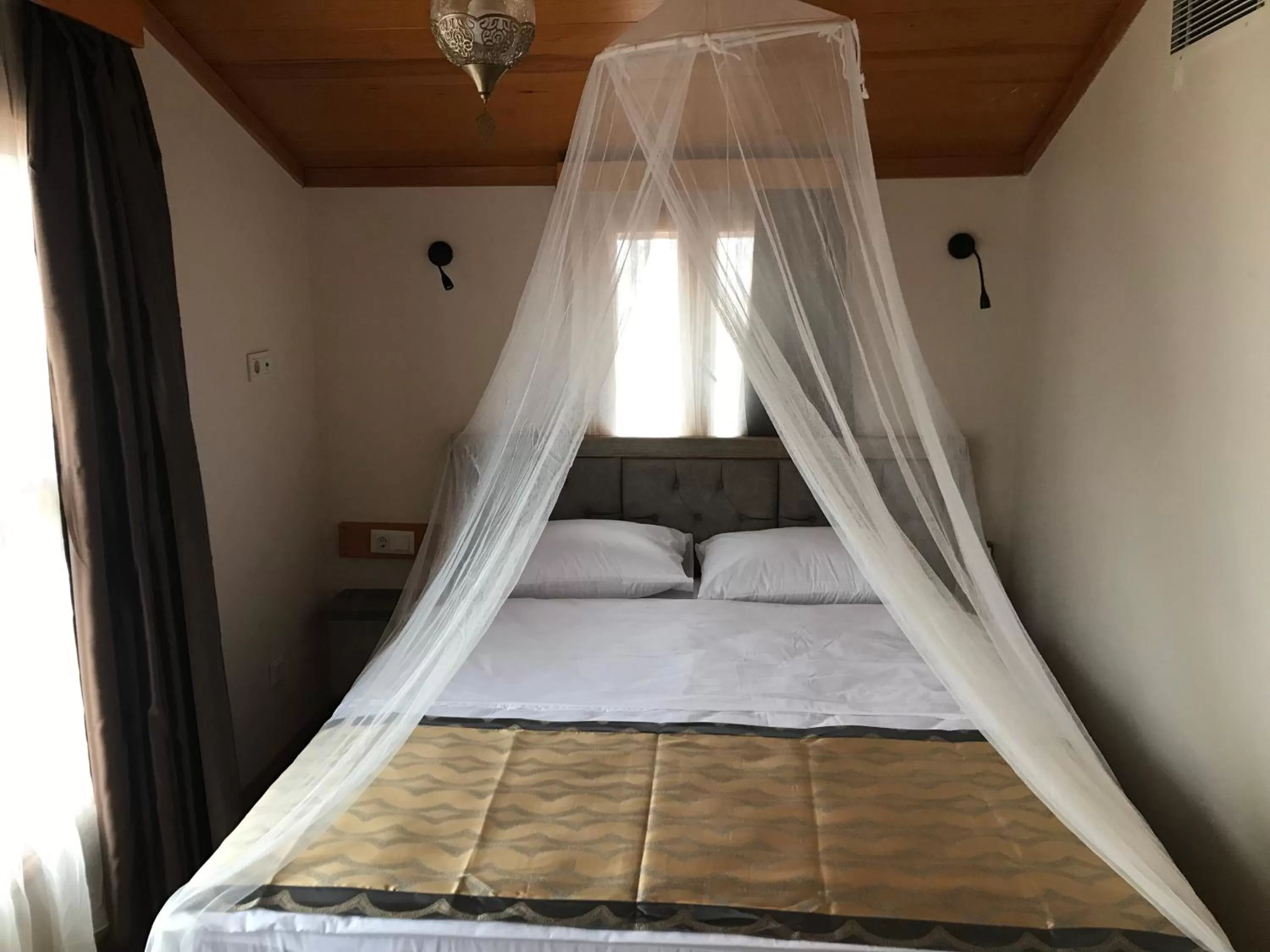 Bed in Green Mansion