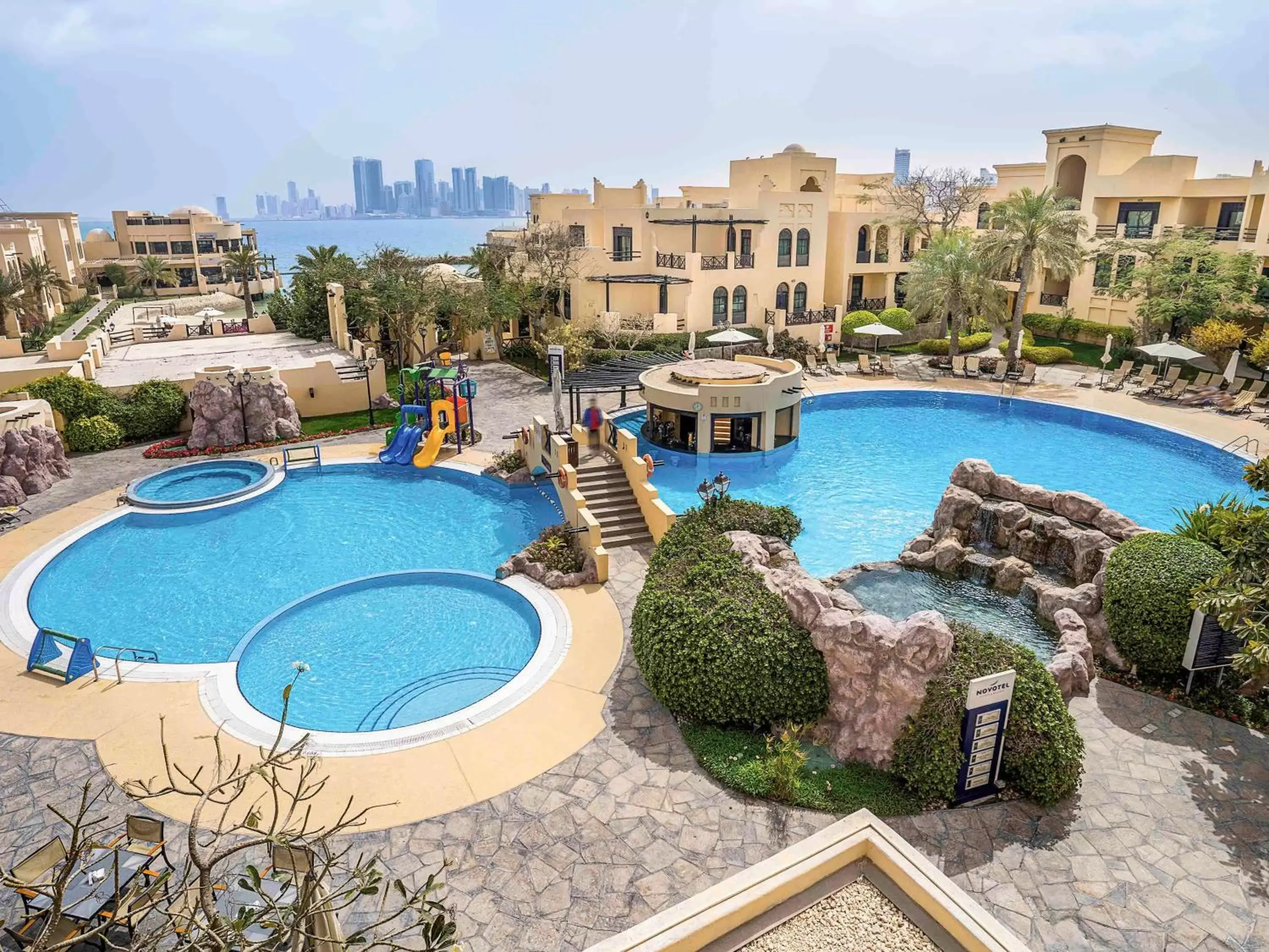 Photo of the whole room, Pool View in Novotel Bahrain Al Dana Resort
